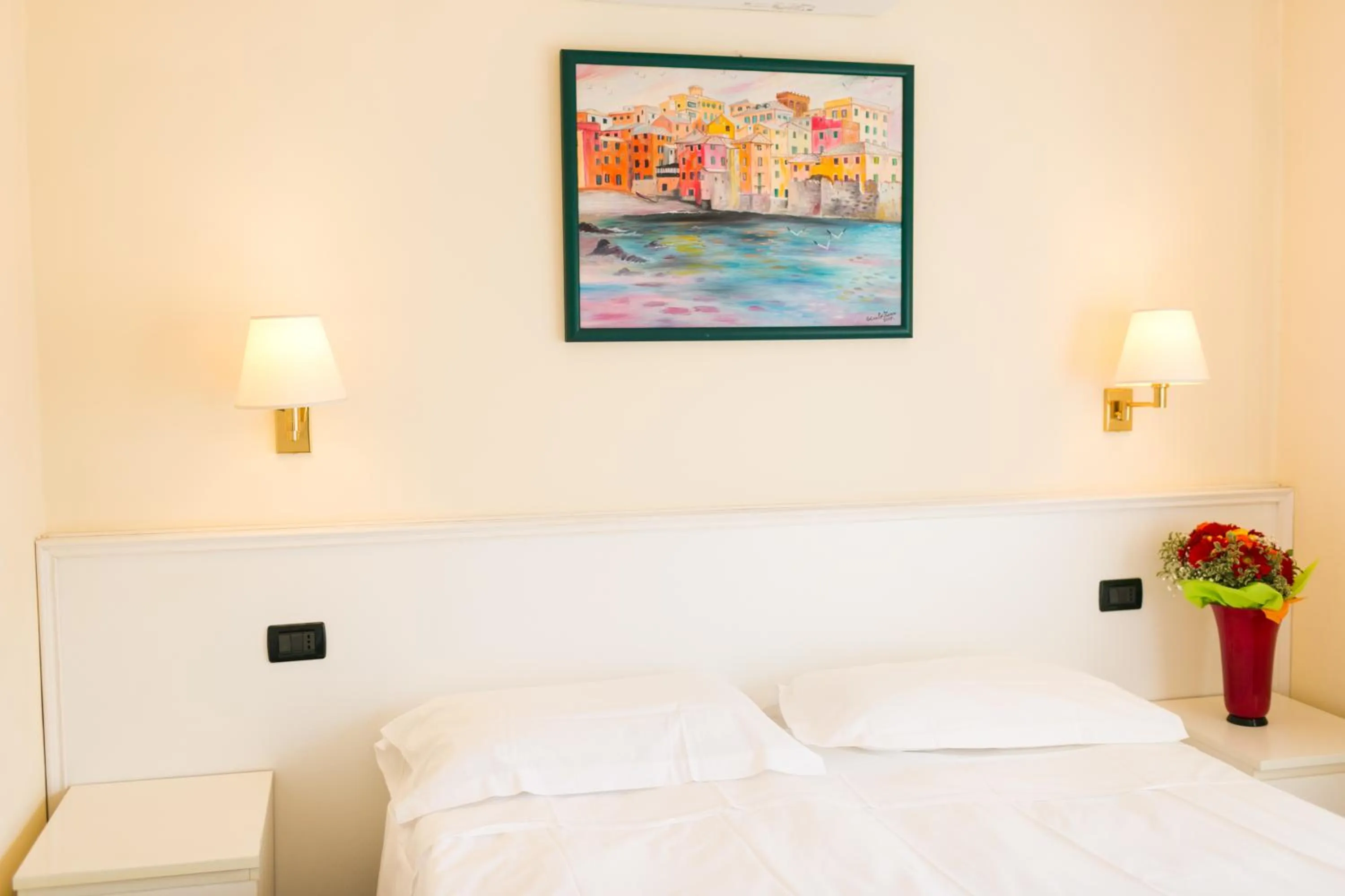 Bed in Rex Hotel Residence