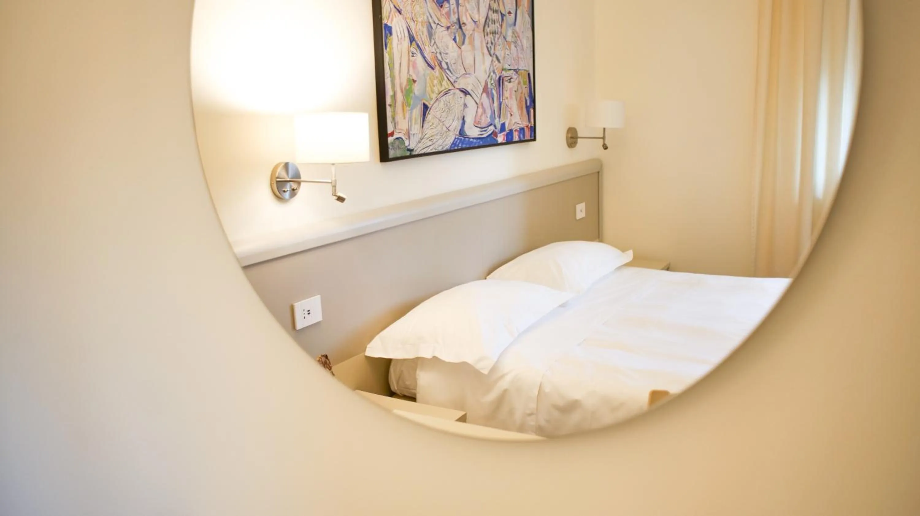 Bed in Rex Hotel Residence