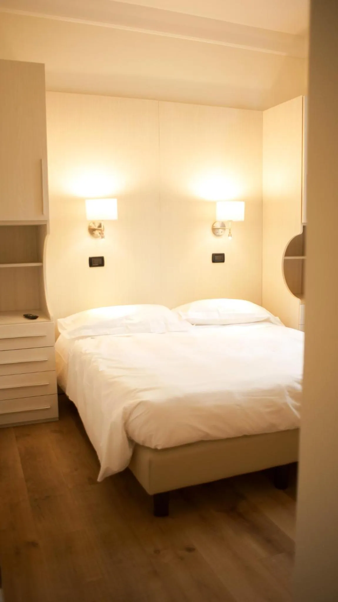 Bed in Rex Hotel Residence