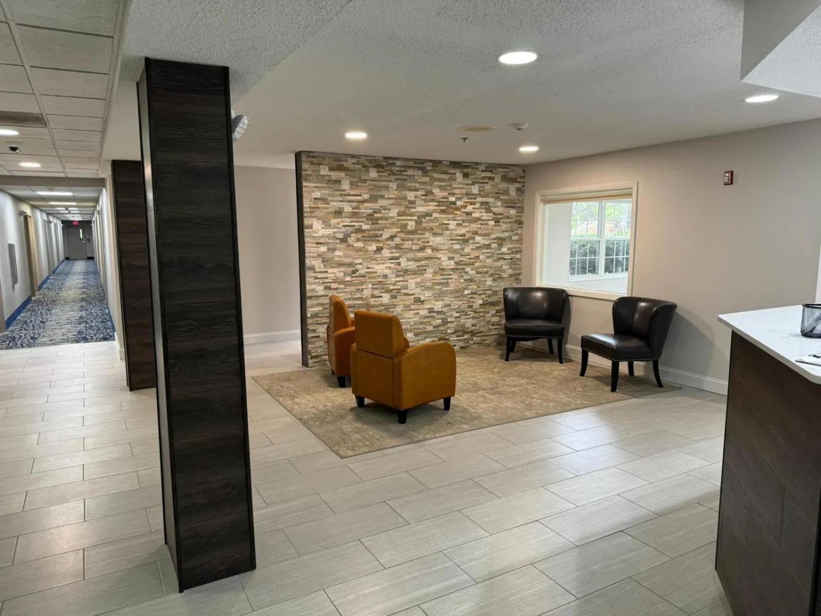 Seating area in Microtel Inn by Wyndham Winston-Salem