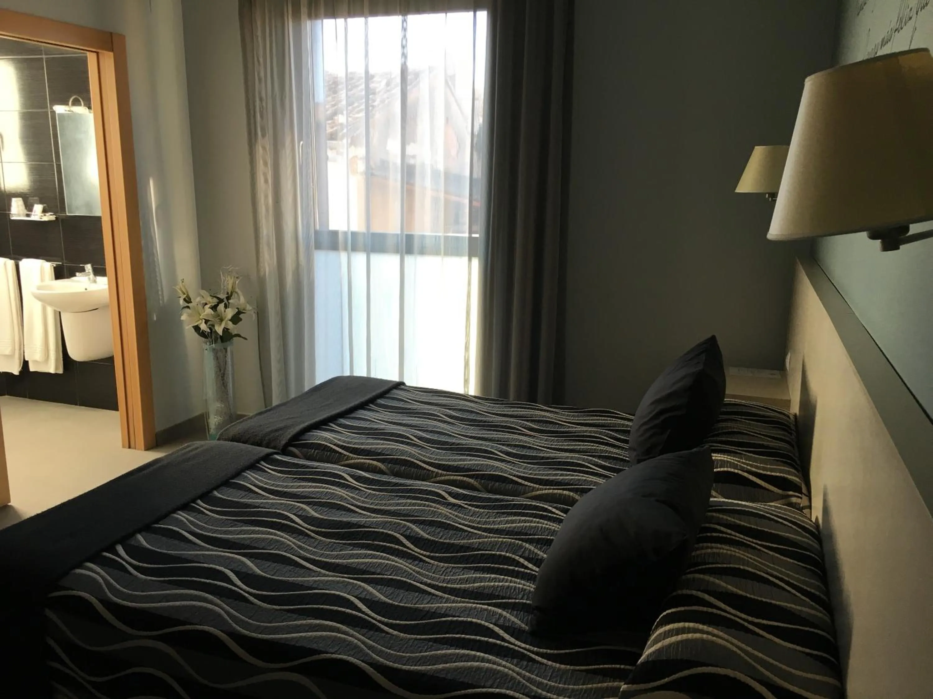 Bed in Hotel HM Alfaro