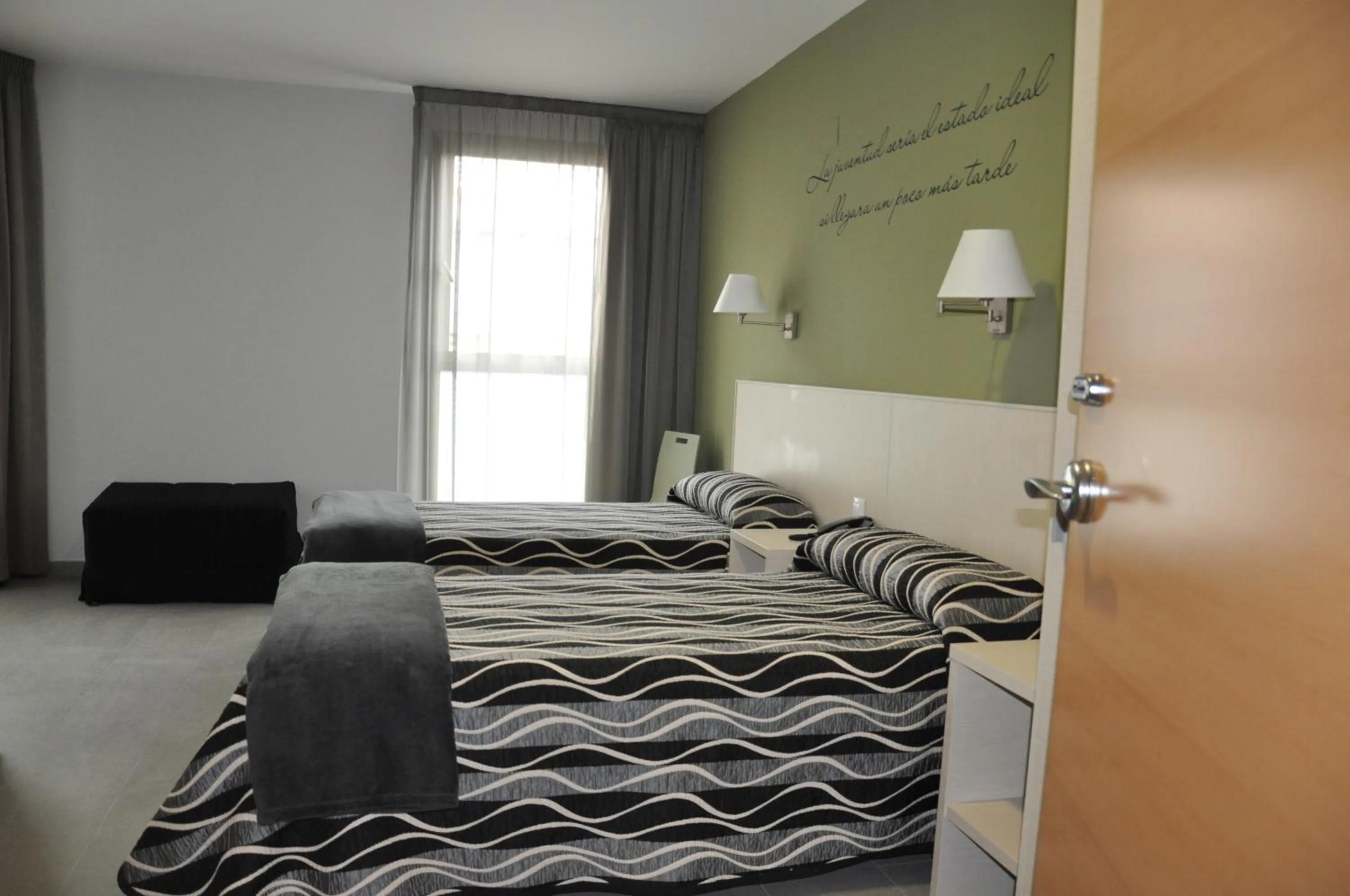 Bed in Hotel HM Alfaro