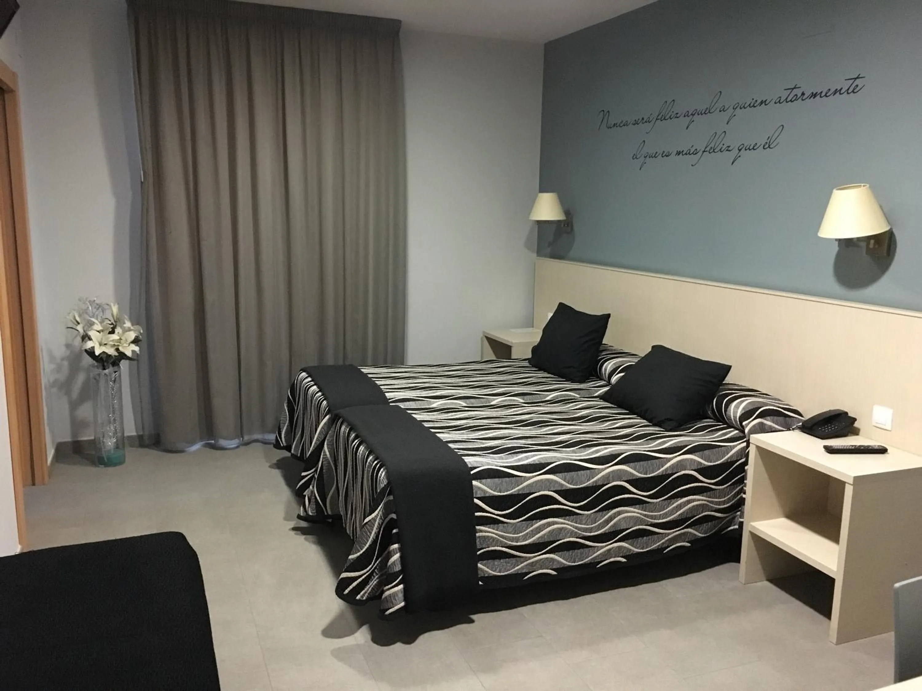 Bed in Hotel HM Alfaro