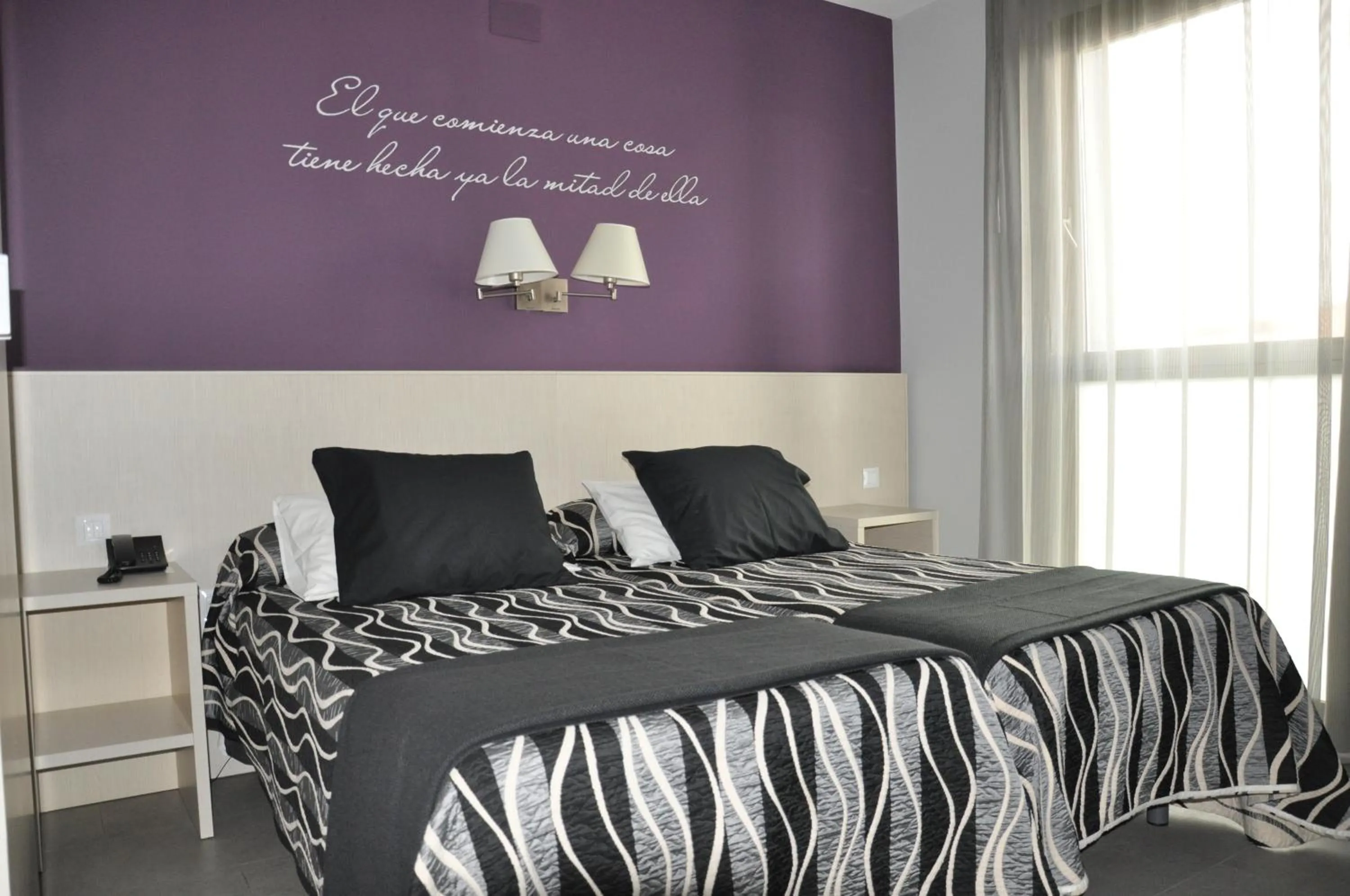 Bed in Hotel HM Alfaro