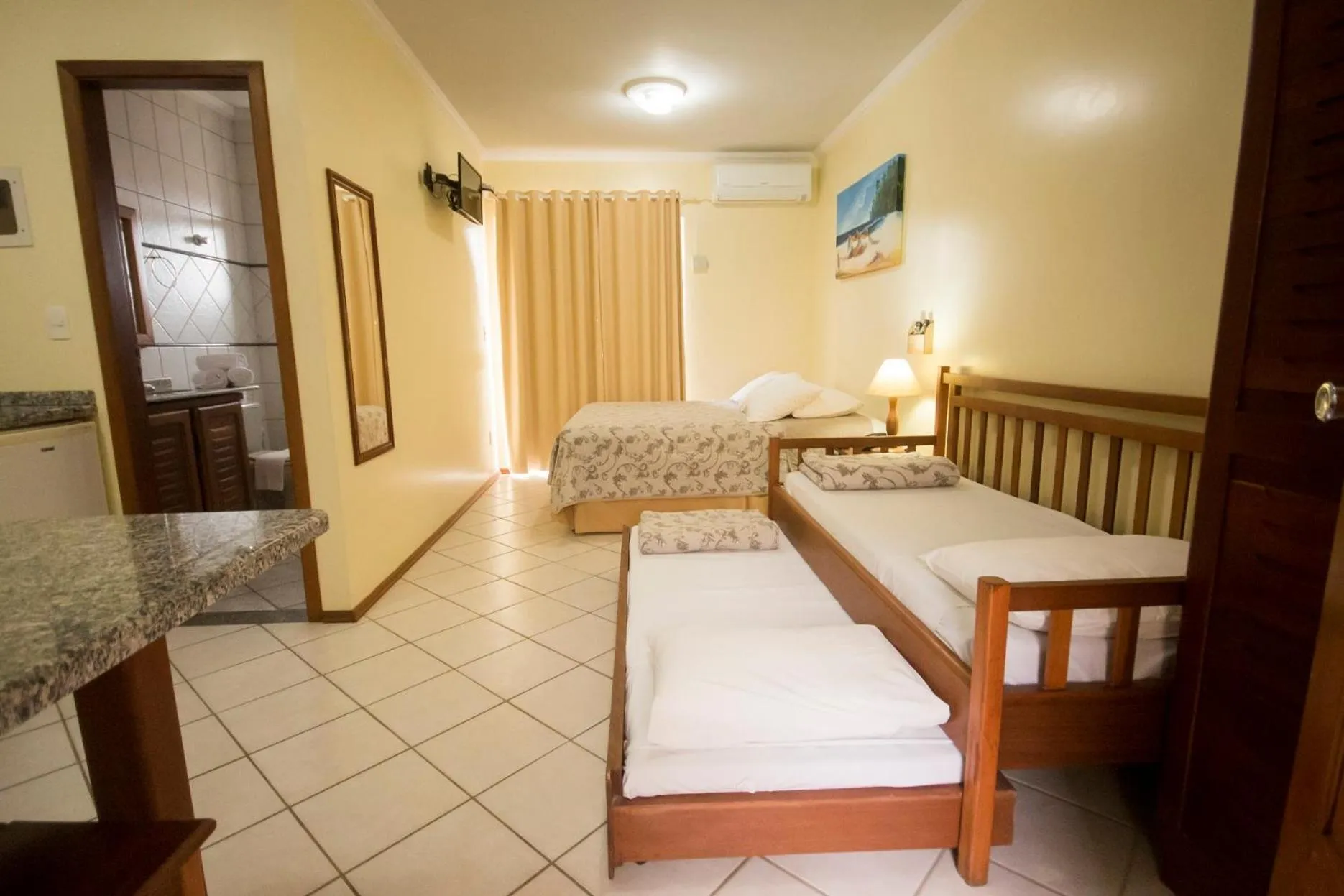 Bed in HANNA San Diego Apart Hotel