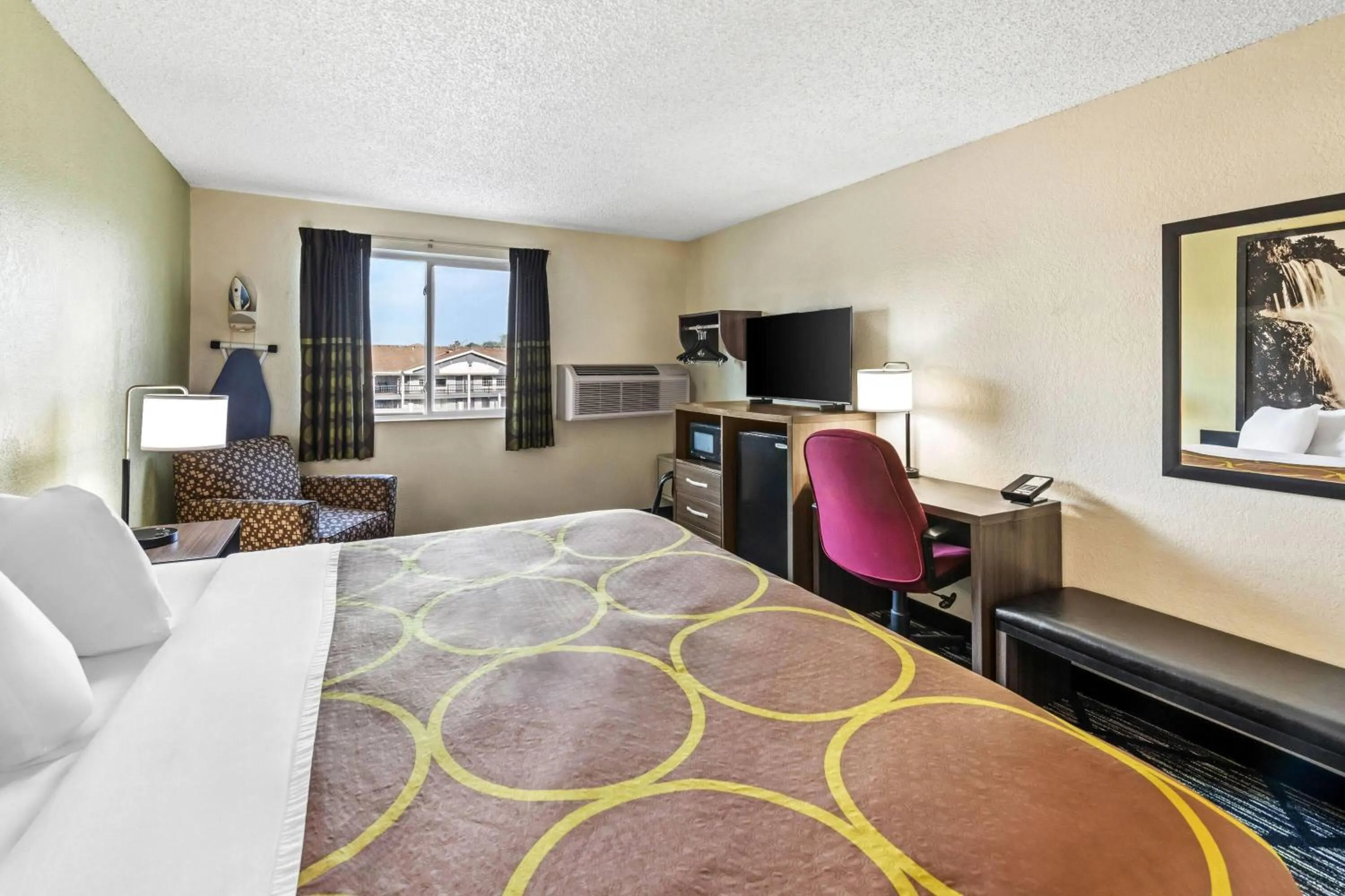 Bed in Super 8 by Wyndham Independence Kansas City