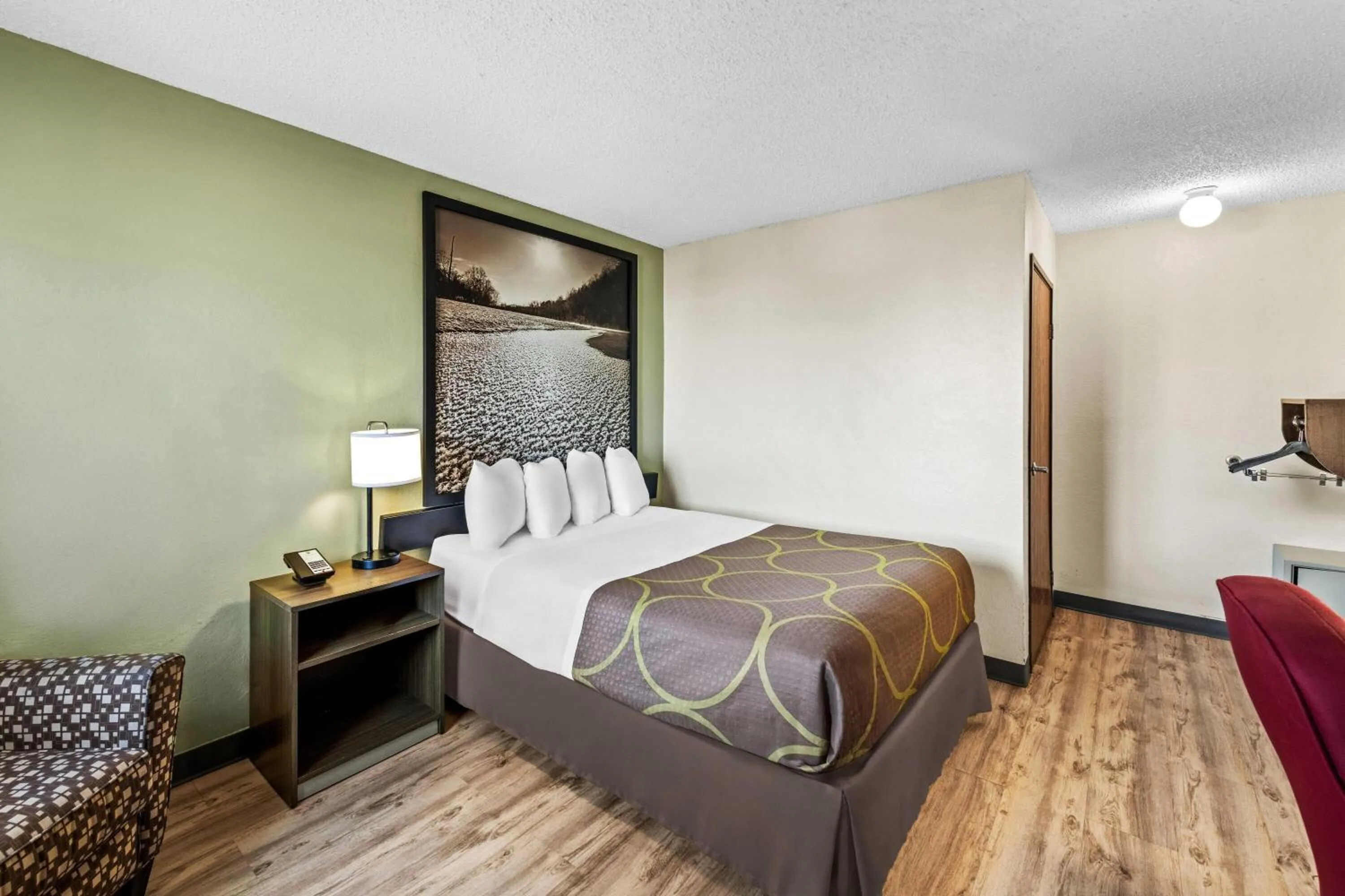 Bed in Super 8 by Wyndham Independence Kansas City