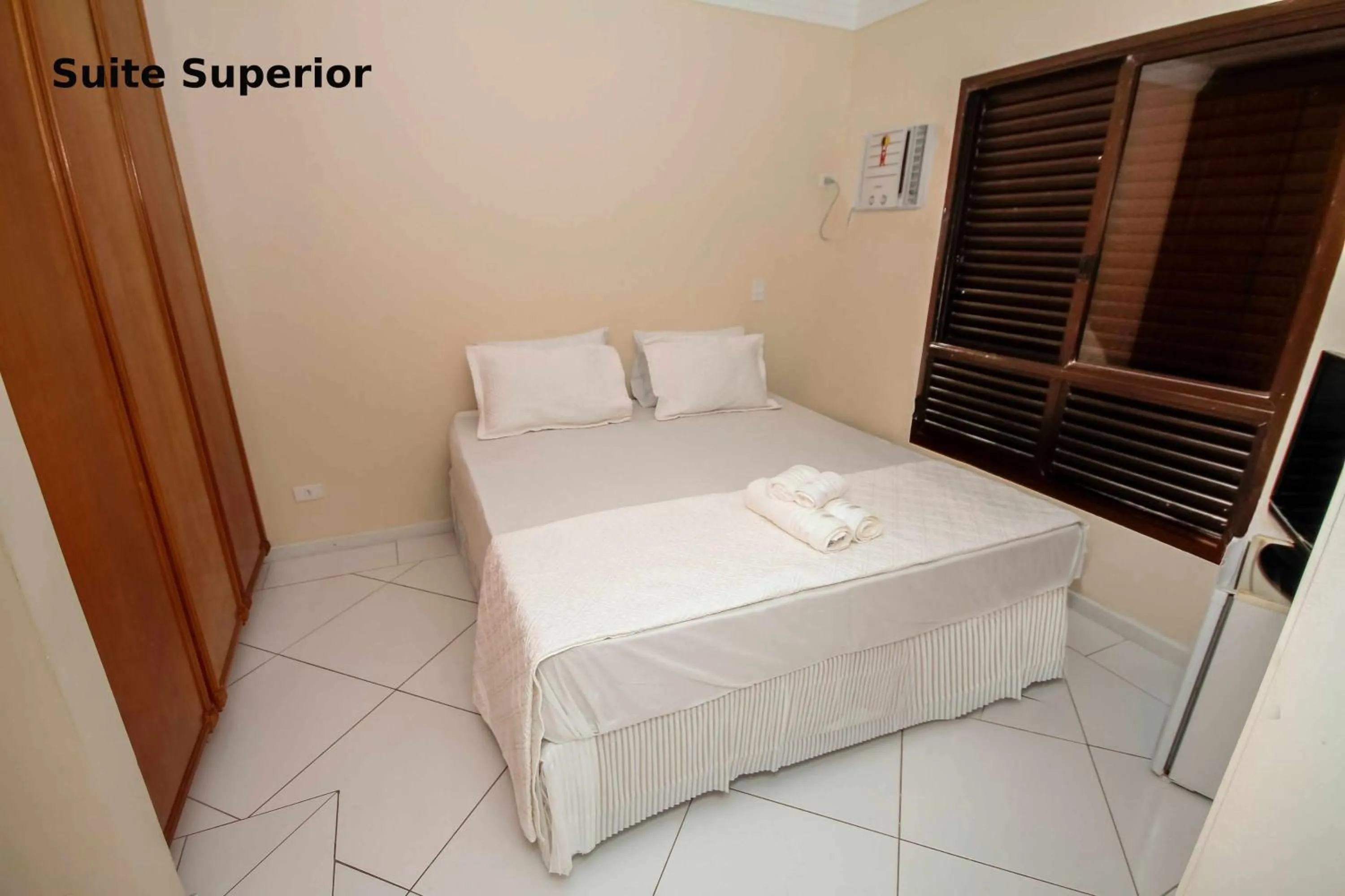 Bed in Suites Natalia Enseada