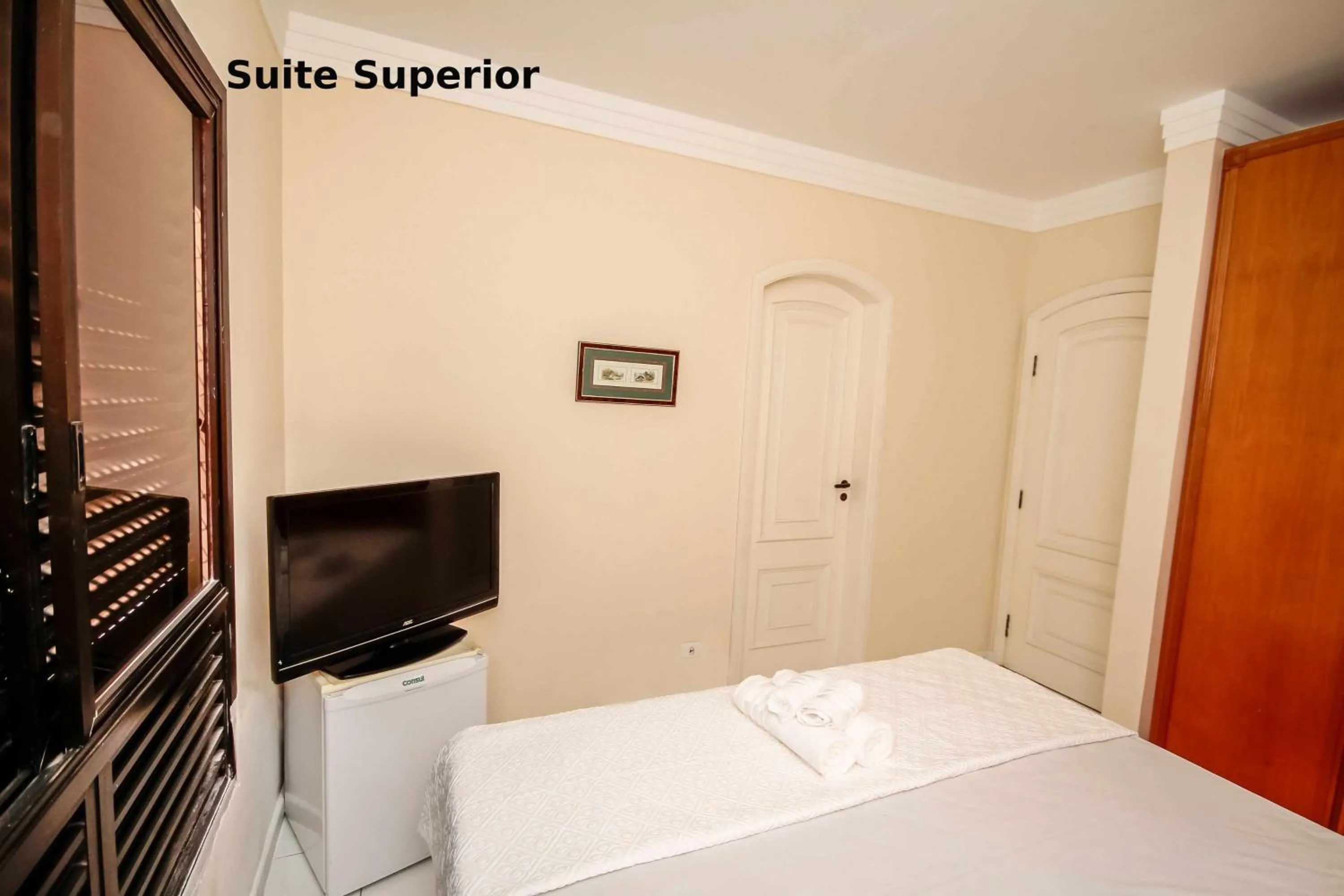 Bed in Suites Natalia Enseada