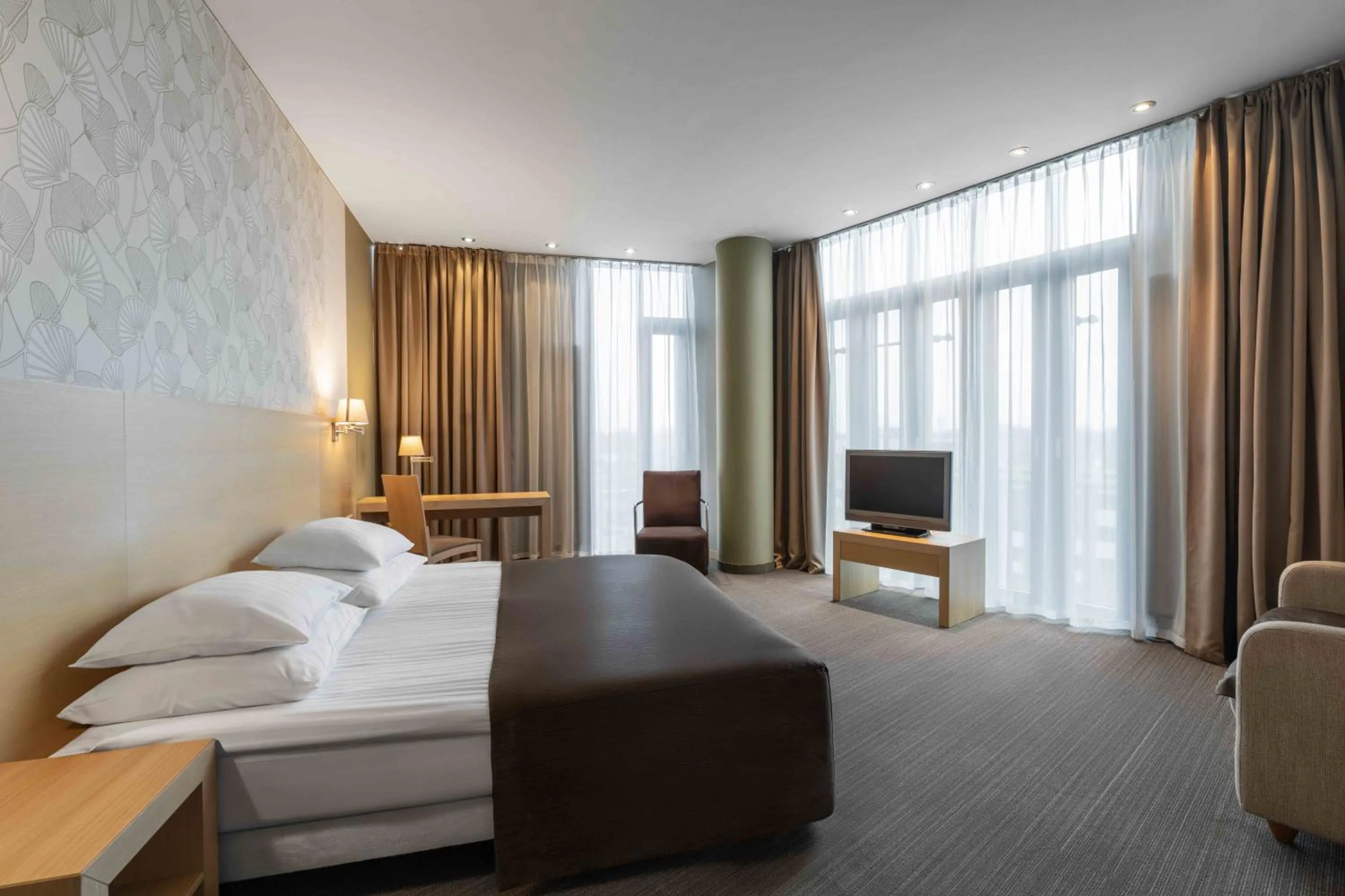 Bed in Rixwell Elefant Hotel