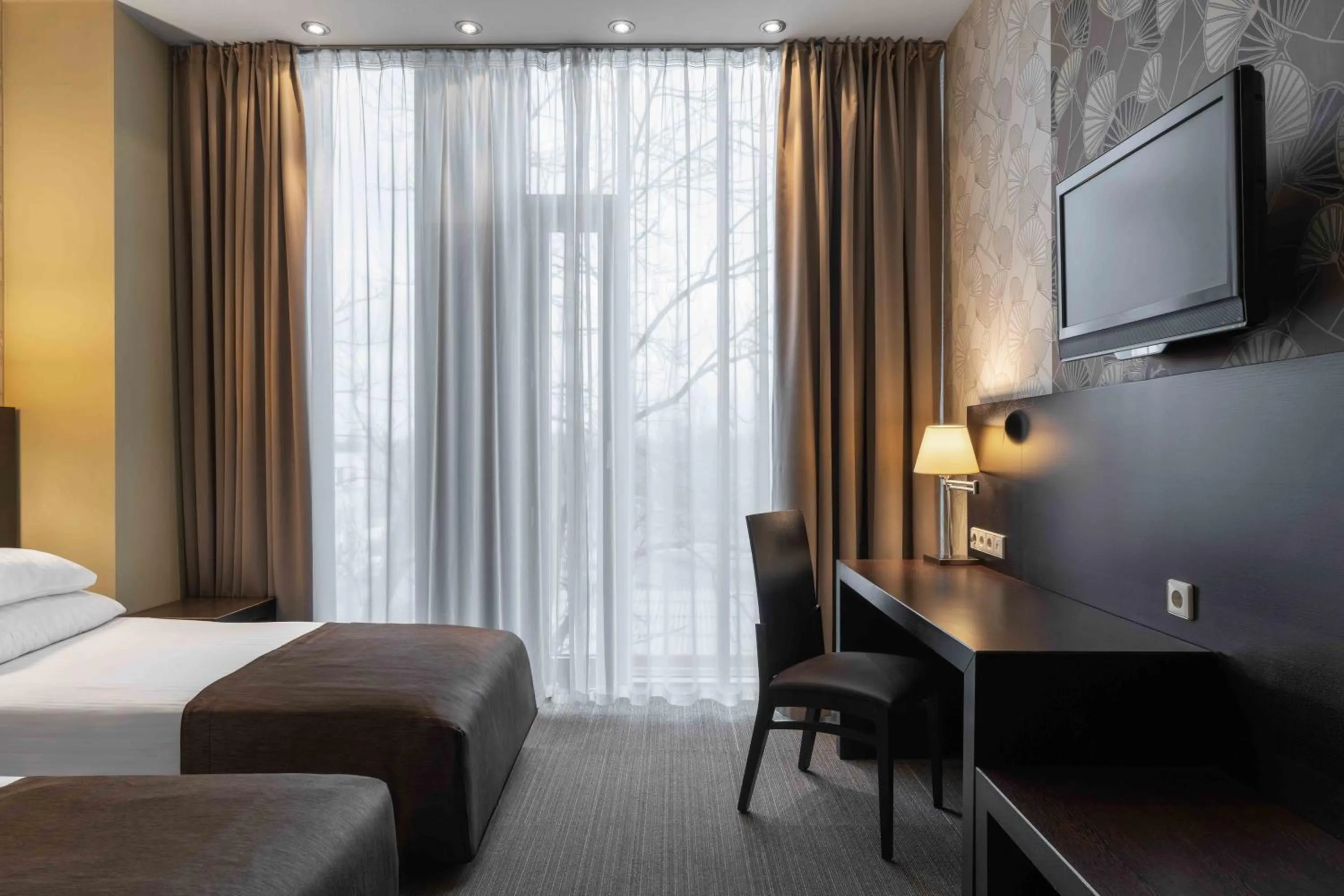 Bed in Rixwell Elefant Hotel