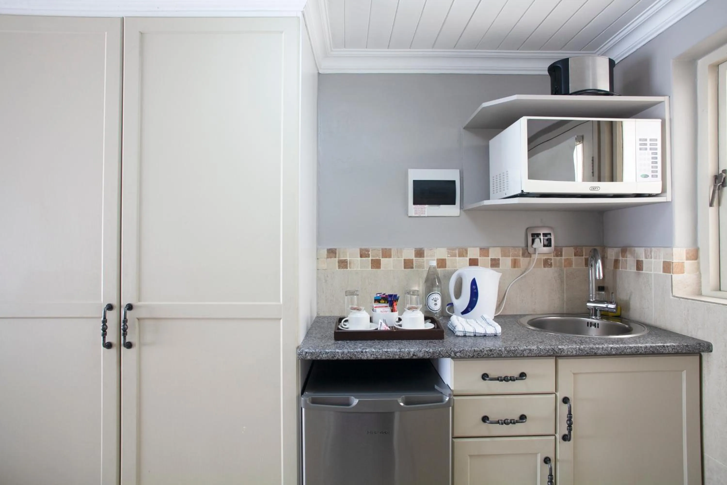 Kitchen or kitchenette in Ruslamere Hotel and Conference Centre