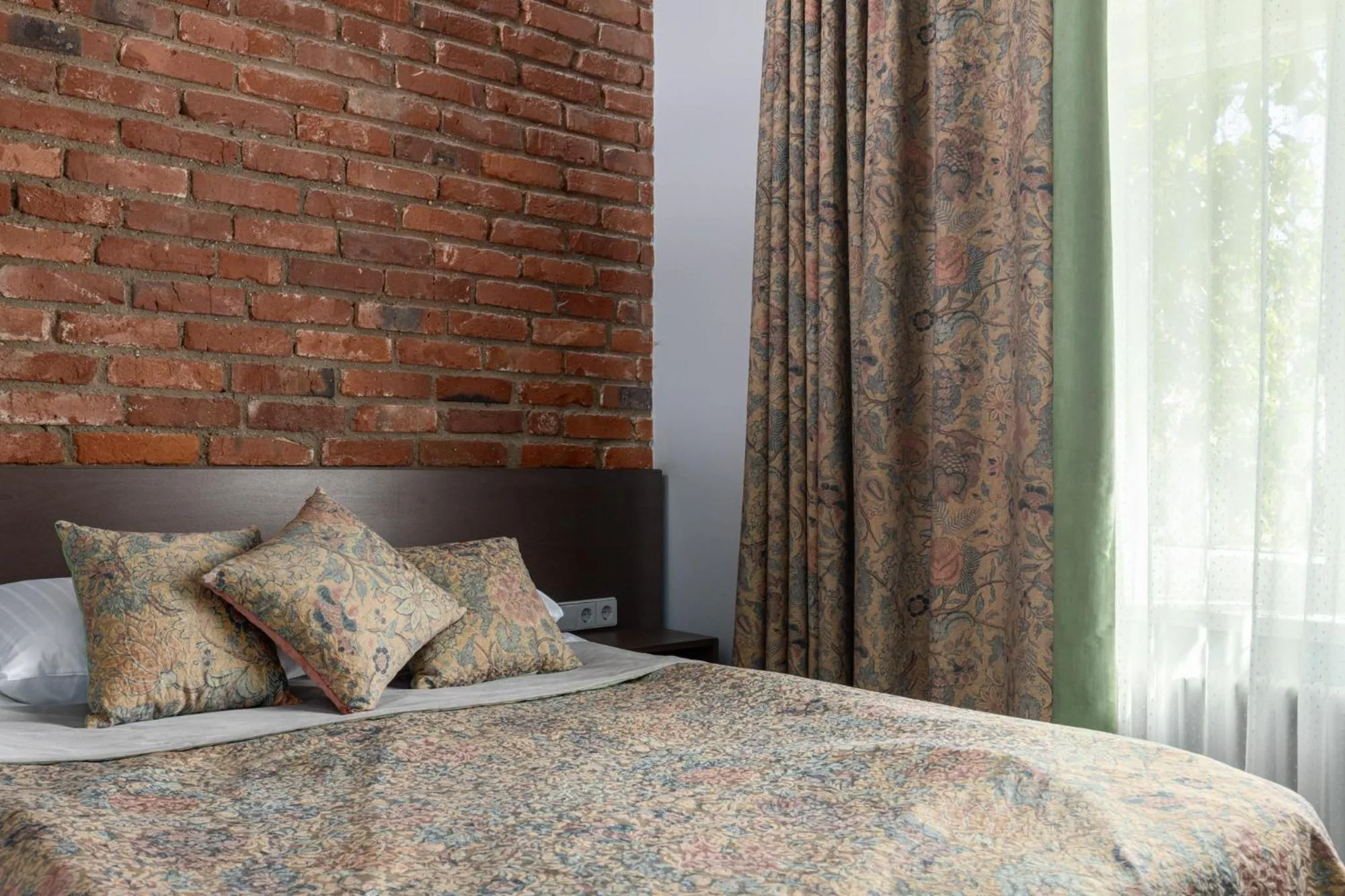 Bed in Roze Boutique Hotel