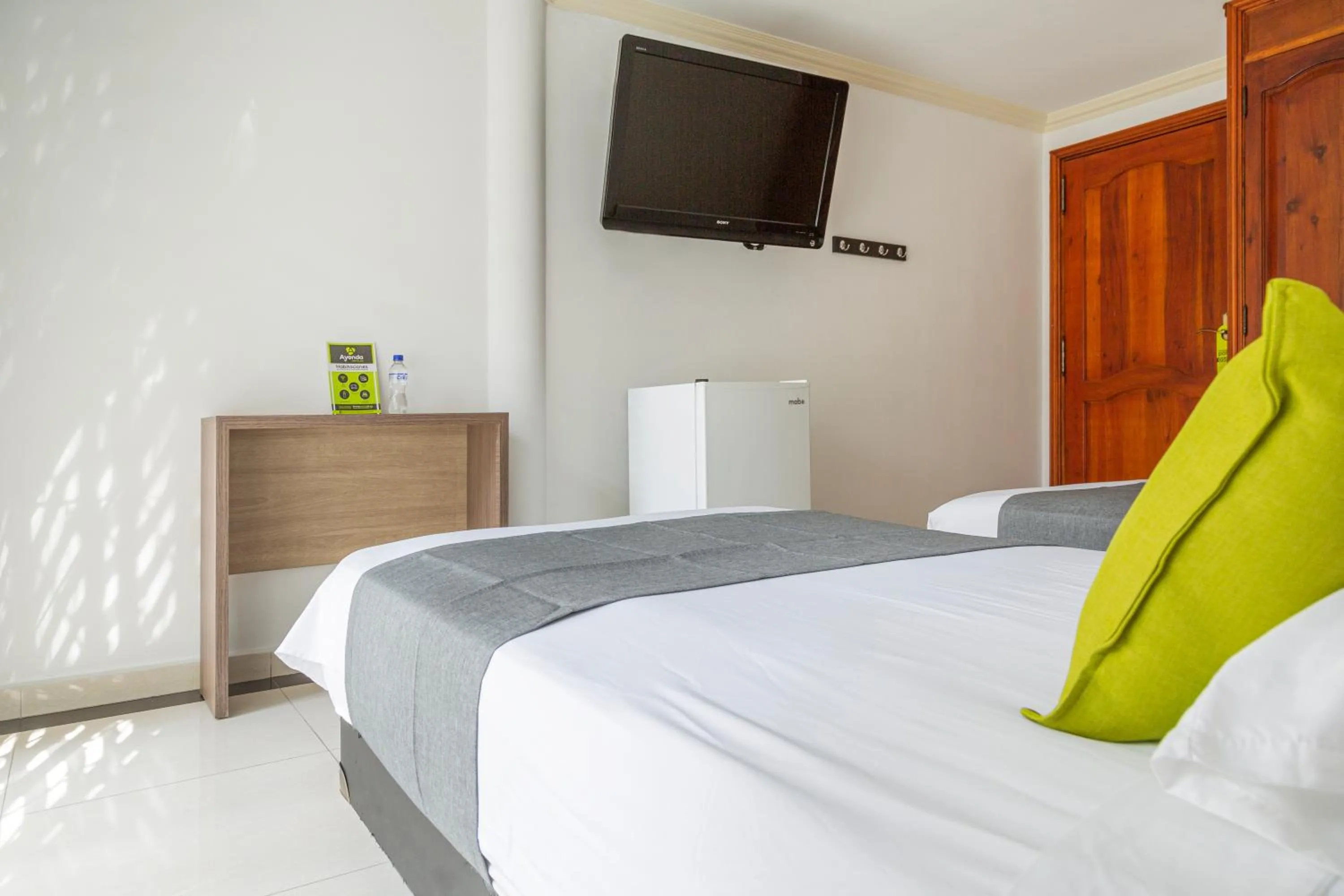 Communal lounge/ TV room, Bed in Hotel Boutique Laureles Home - Ayenda 1258