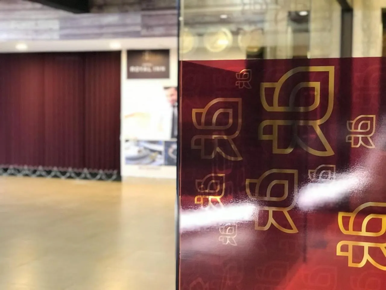 Property logo or sign in Hotel Royal Inn - Electronic City