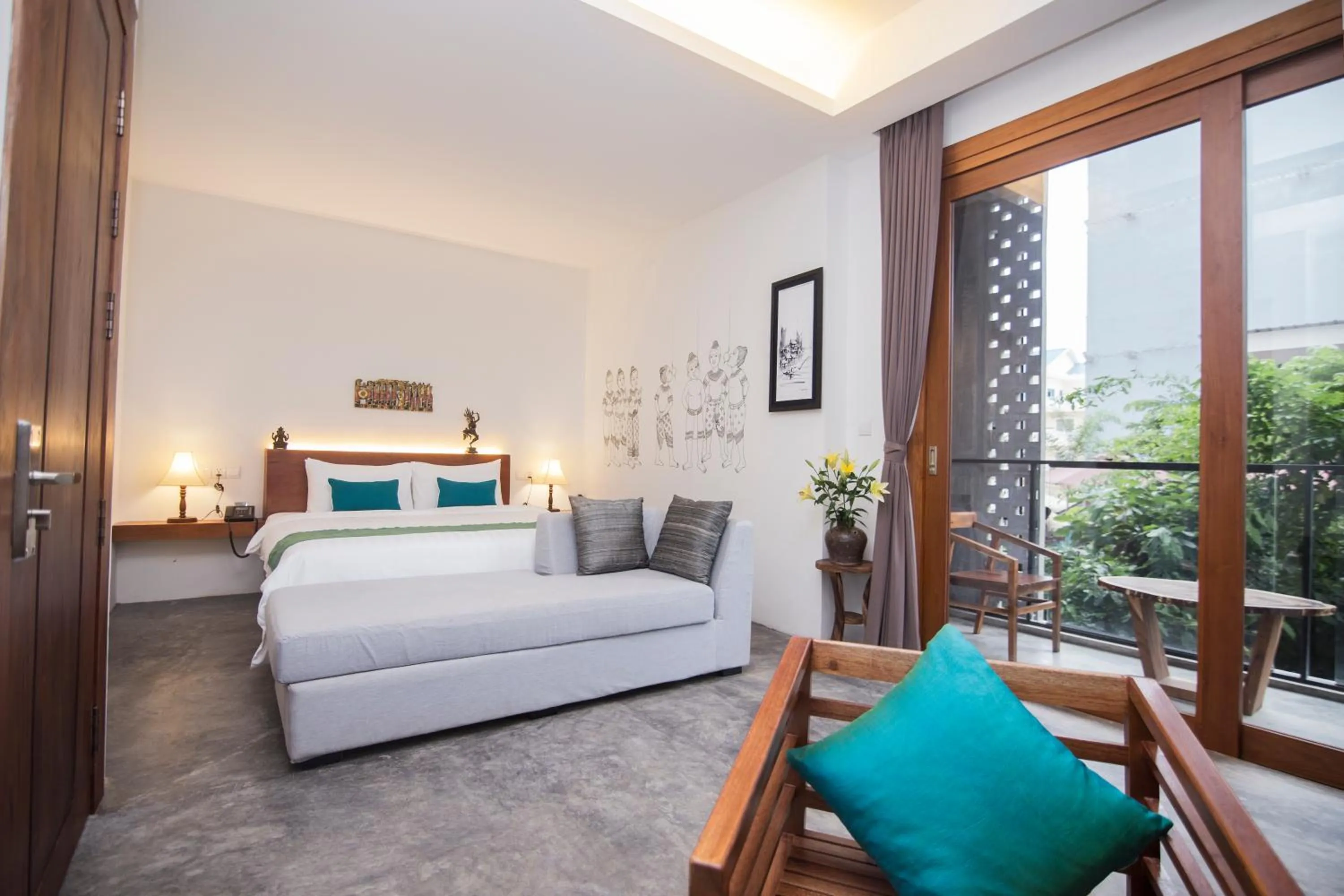 Photo of the whole room, Bed in Sarina Boutique Hotel