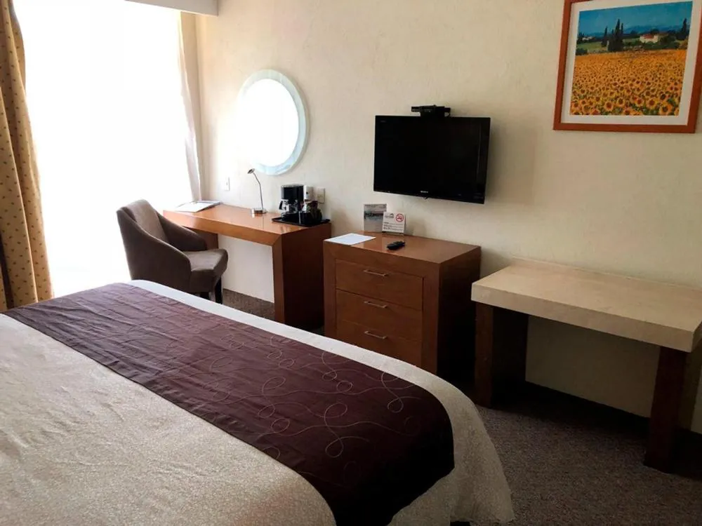 Seating area, Bed in Hotel Las Trojes