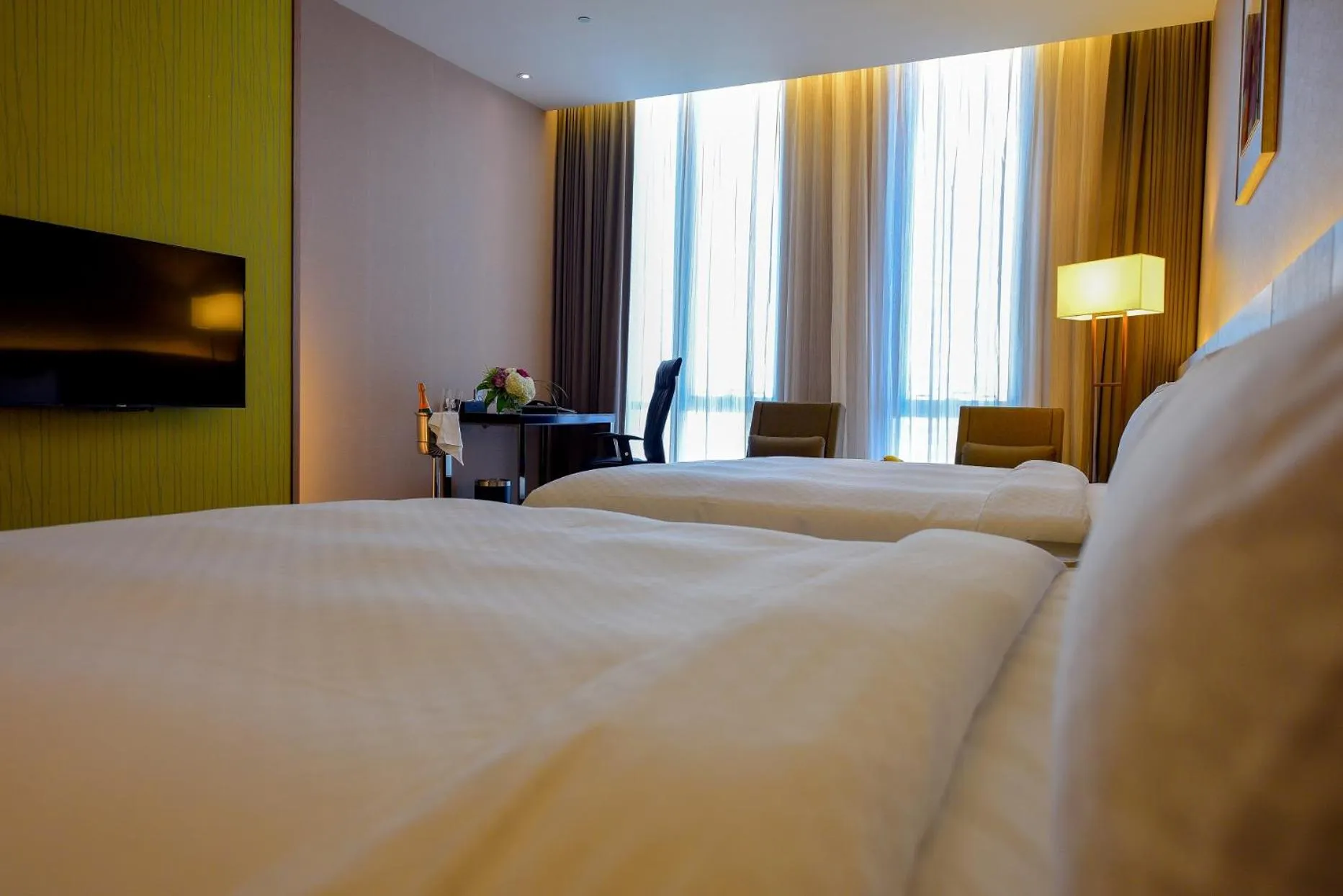 Bed in Grand Royal Hotel