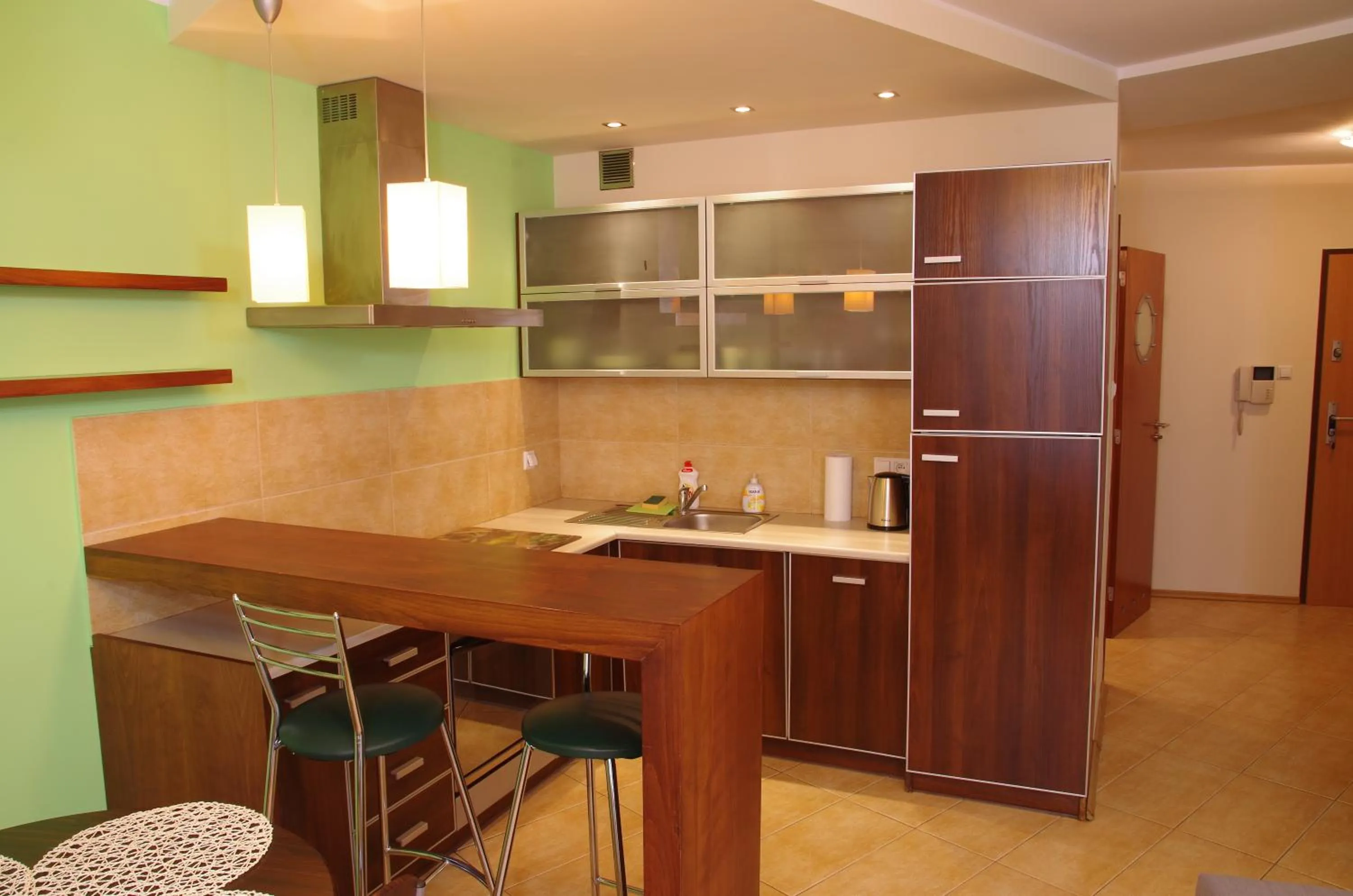 Kitchen or kitchenette in Szucha Apartments