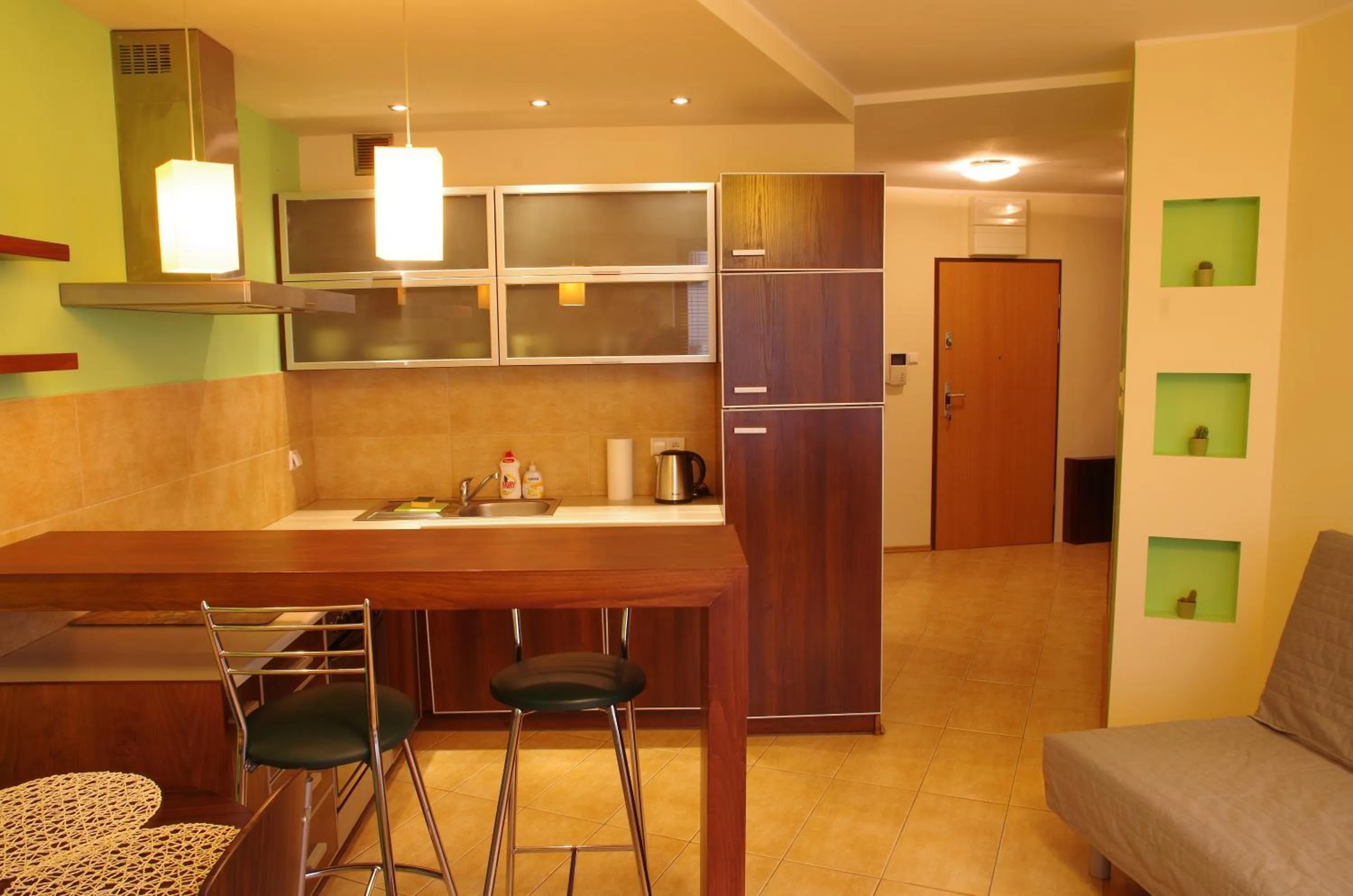Kitchen or kitchenette in Szucha Apartments