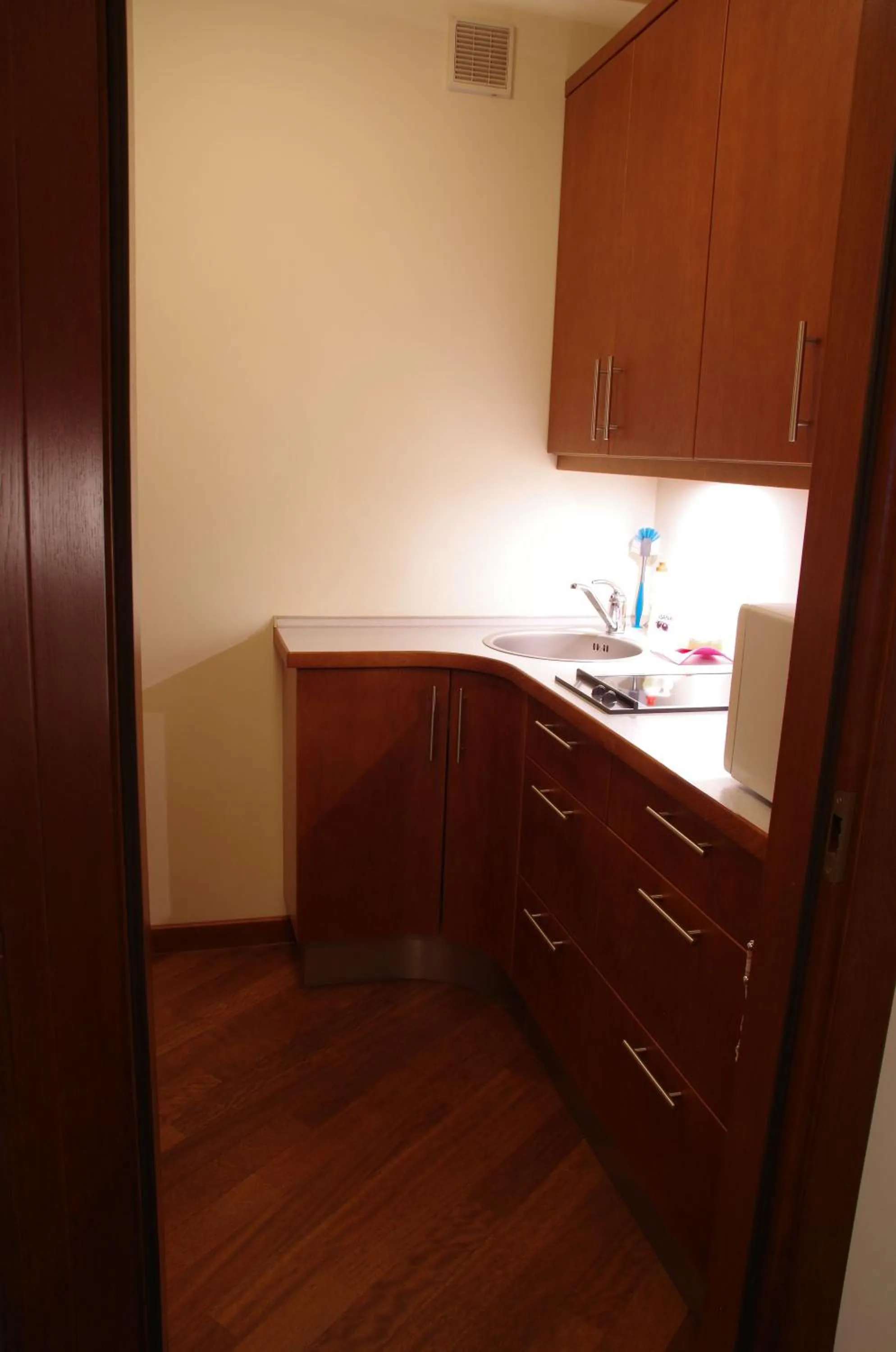 Kitchen or kitchenette in Szucha Apartments