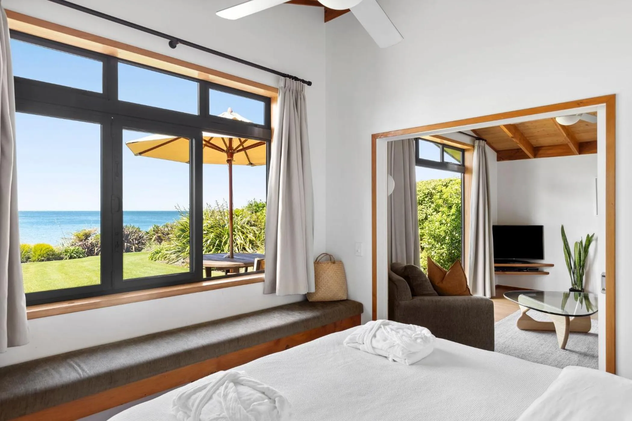 Bed in Adrift In Golden Bay- Absolute Beachfront Villas
