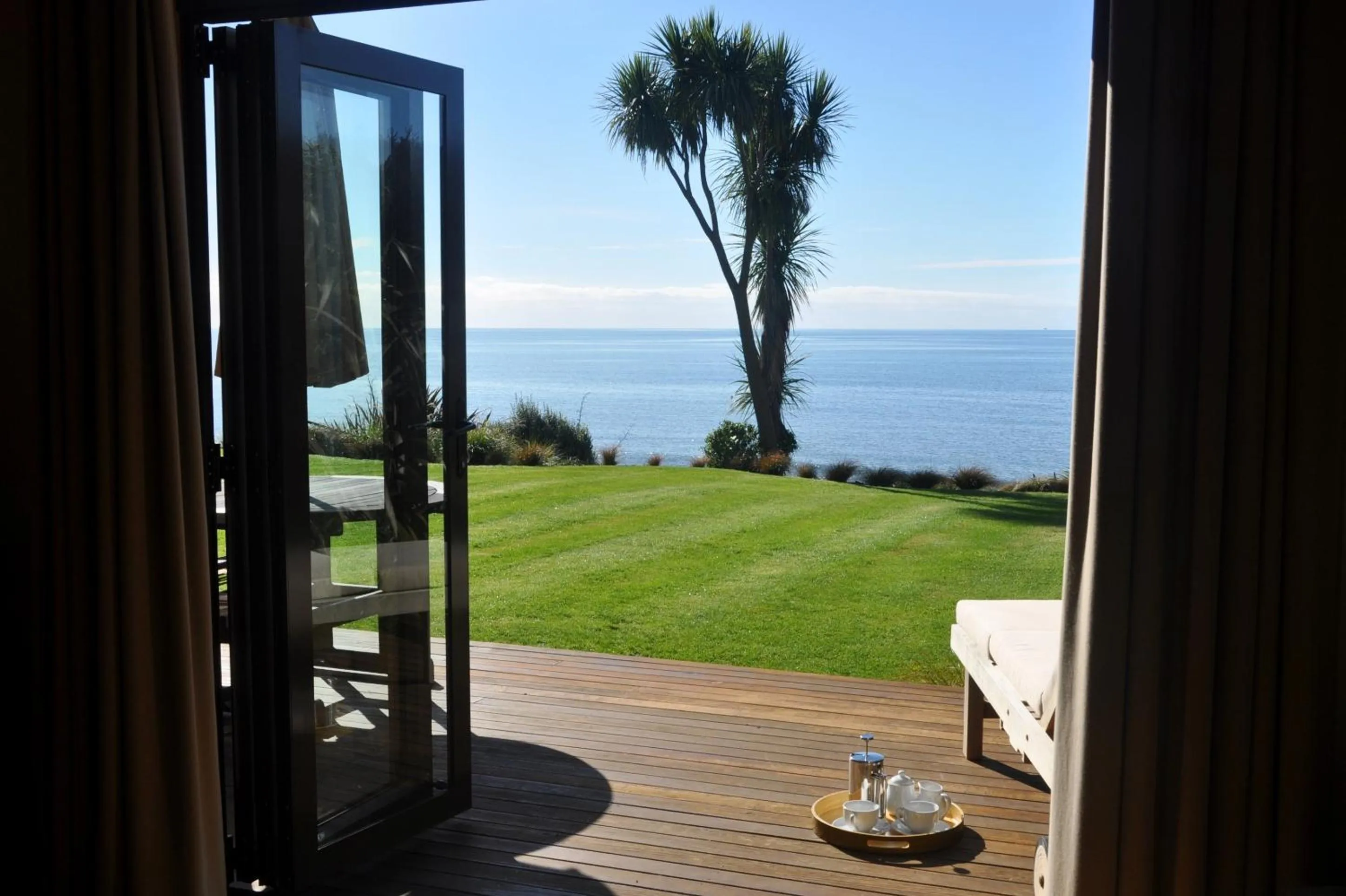 Garden in Adrift In Golden Bay- Absolute Beachfront Villas