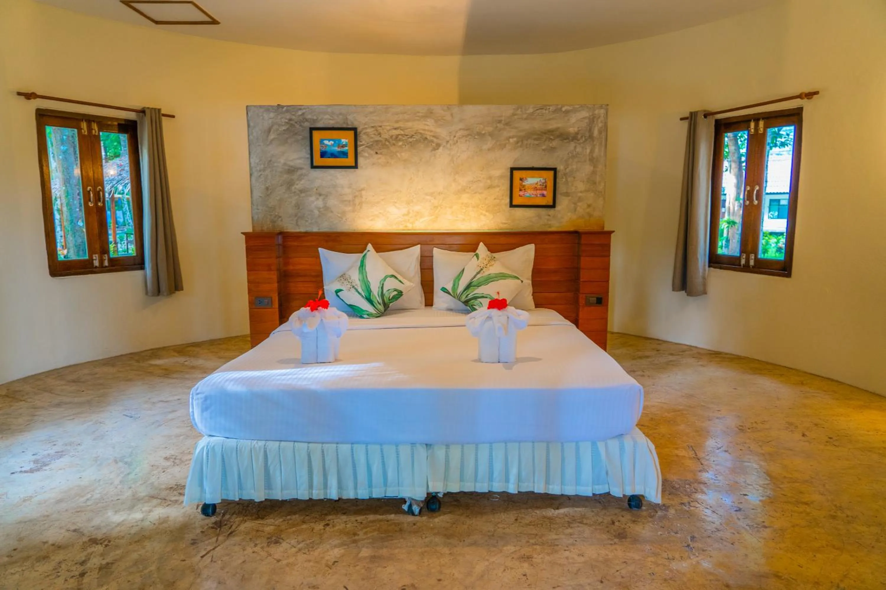 Bed in The Tropical Beach Resort