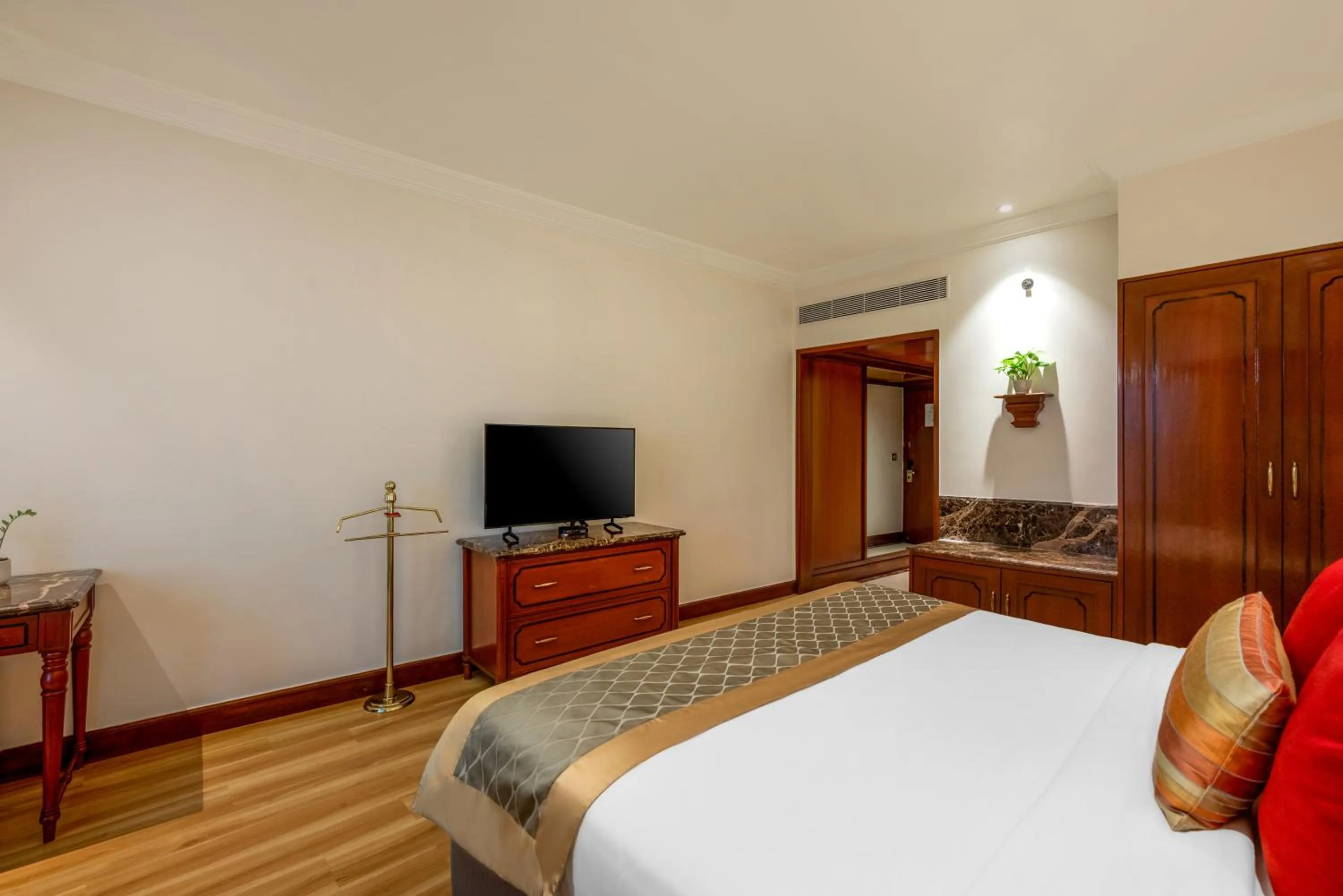 Bed in The Orchid Hotel Mumbai Vile Parle