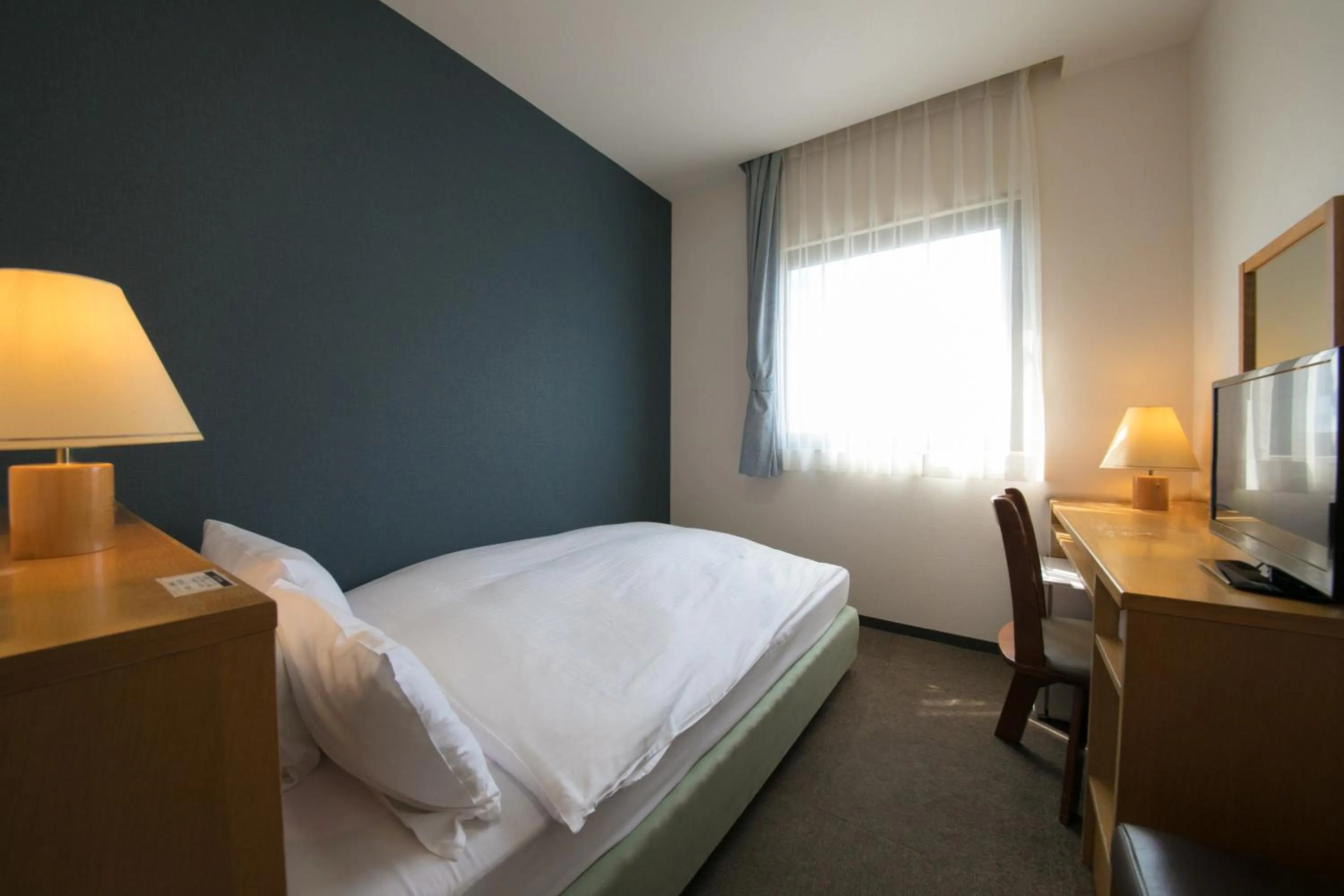 Photo of the whole room, Bed in Heiwadai Hotel 5