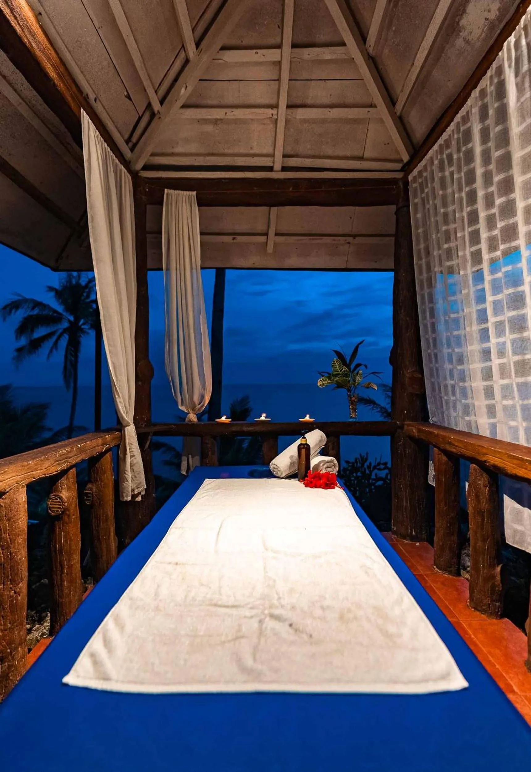 Bed in Blue Star Dive and Resort