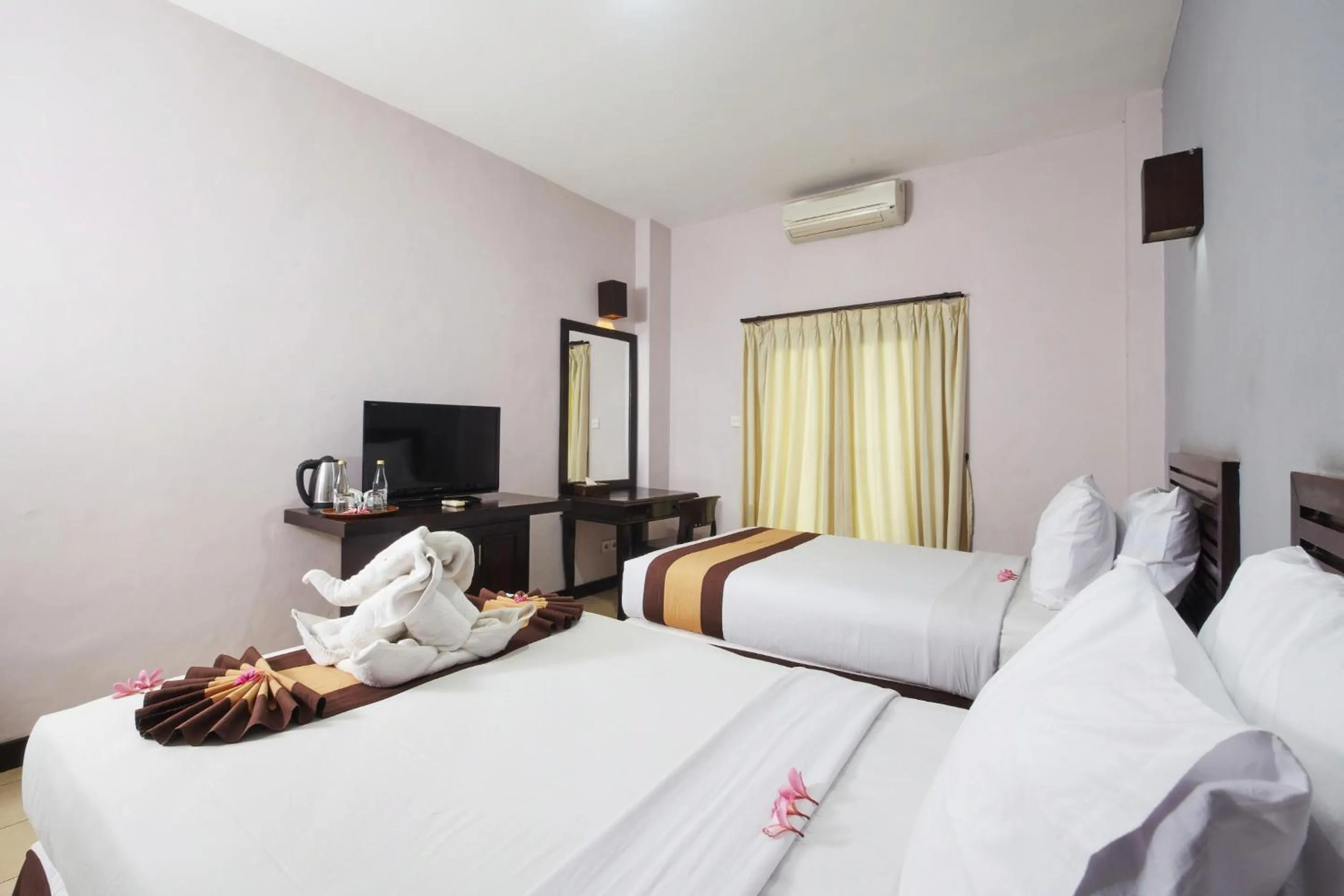 Bedroom, Bed in Grand Santhi Hotel