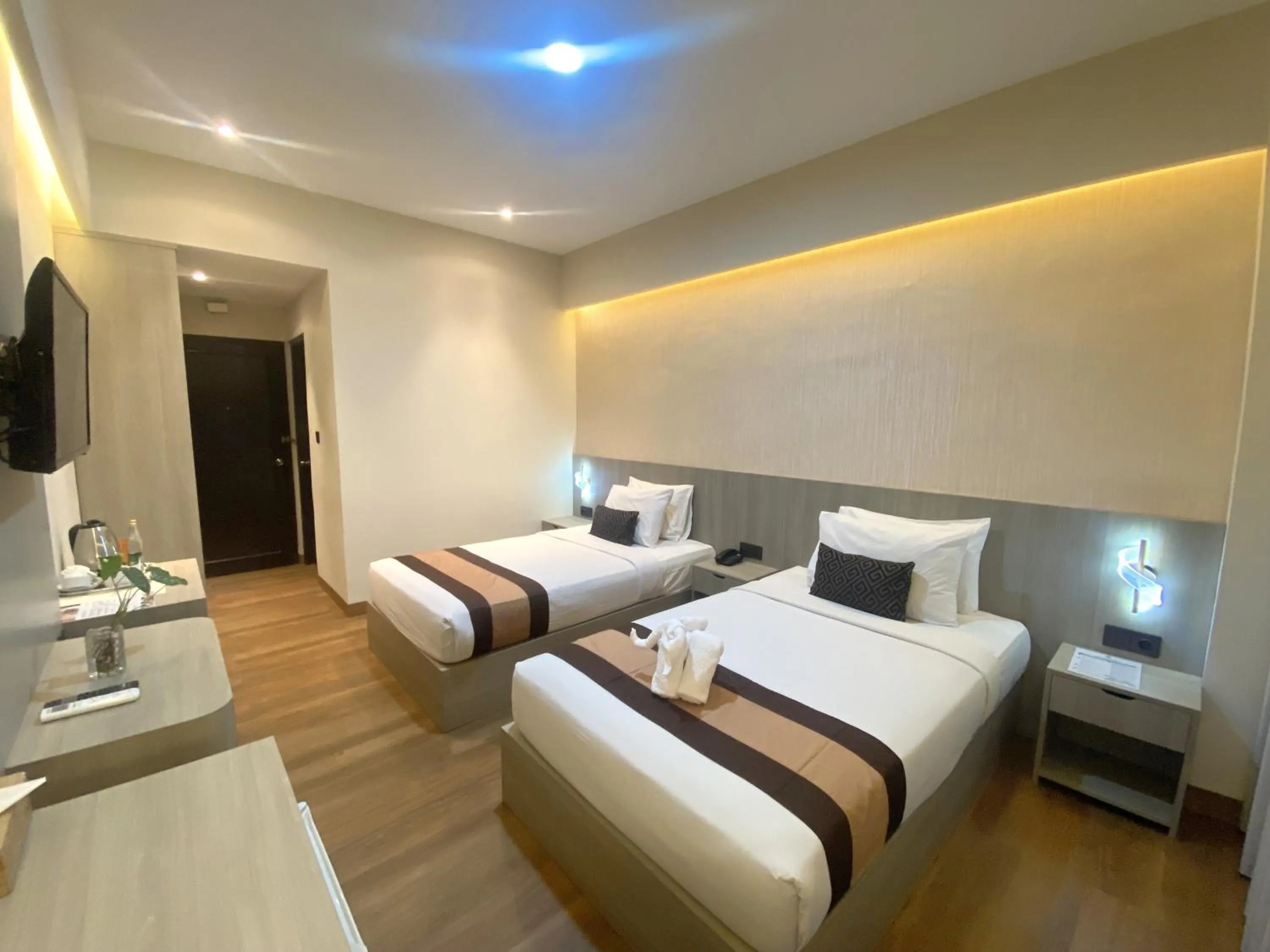 Bedroom, Bed in Grand Santhi Hotel