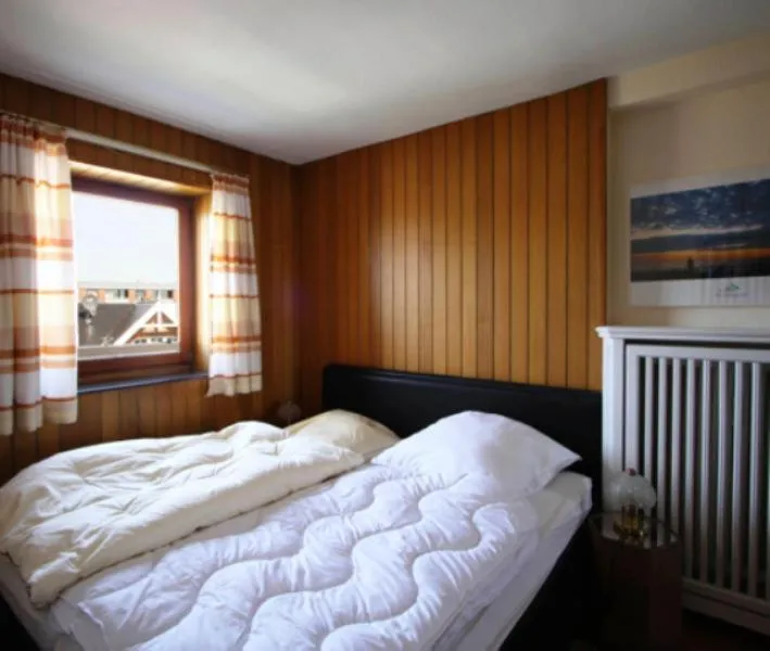 Bed in Wohnung-Westerlandblick
