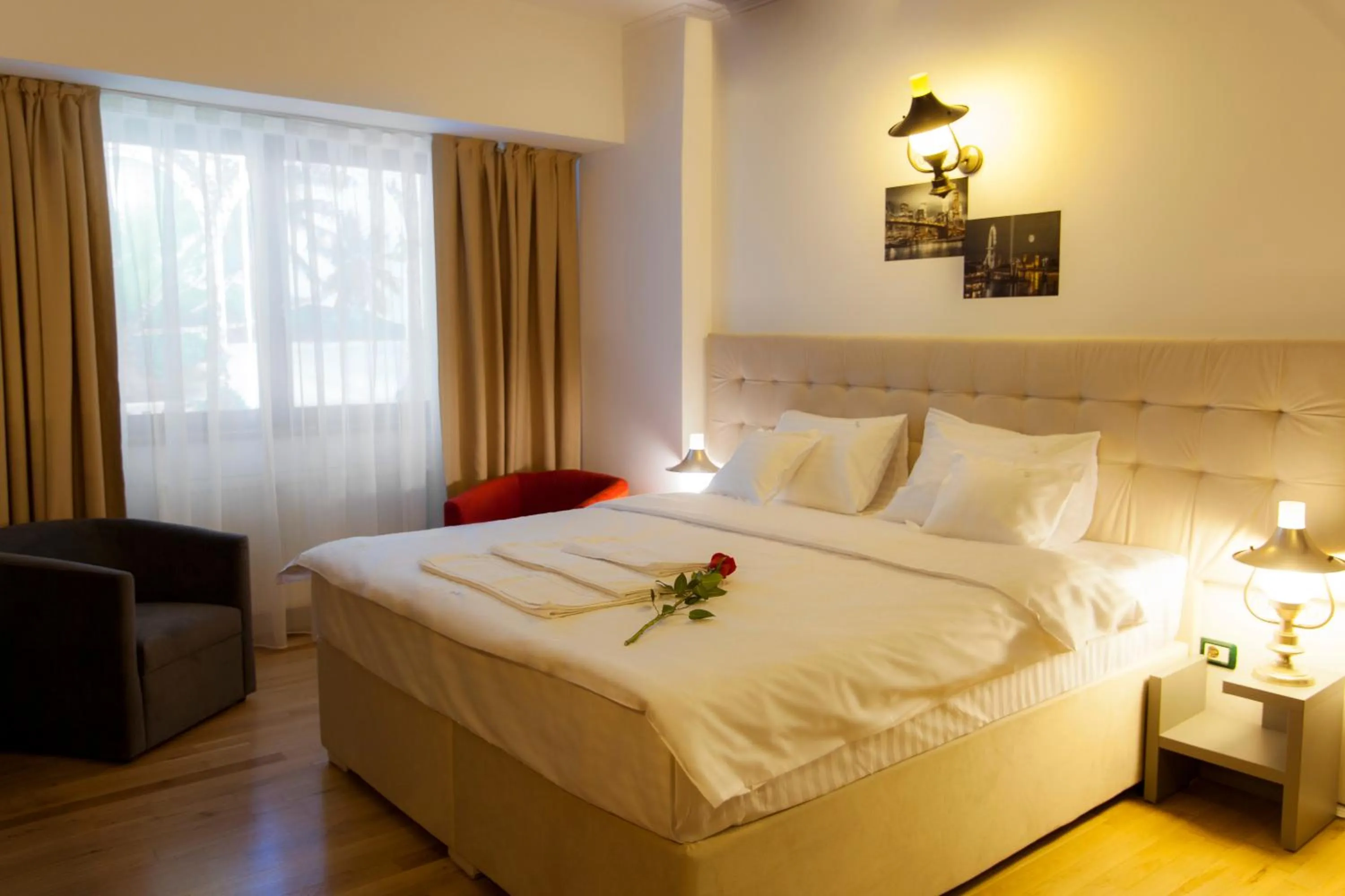 Bed in Ambra Boutique Hotel & Bistro