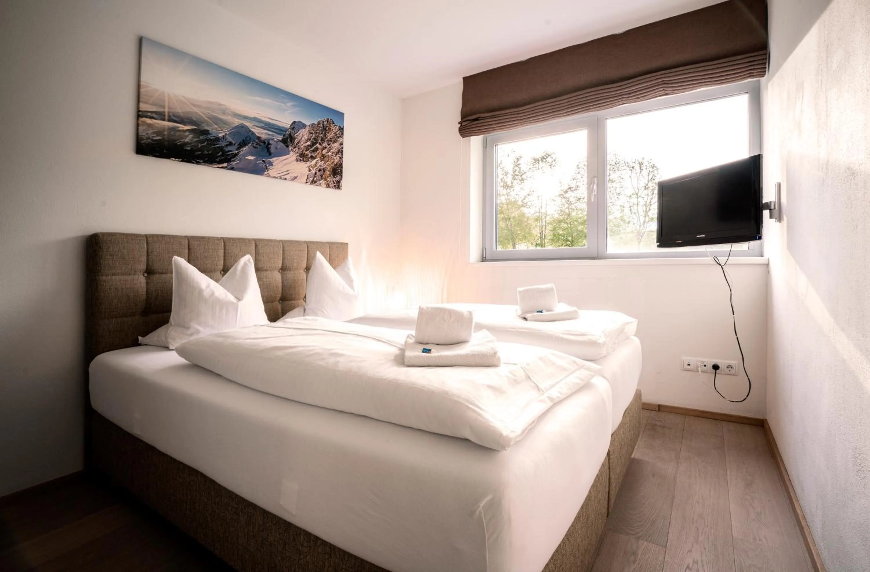 Bed in Tauernresidence Radstadt by ALPS RESORTS