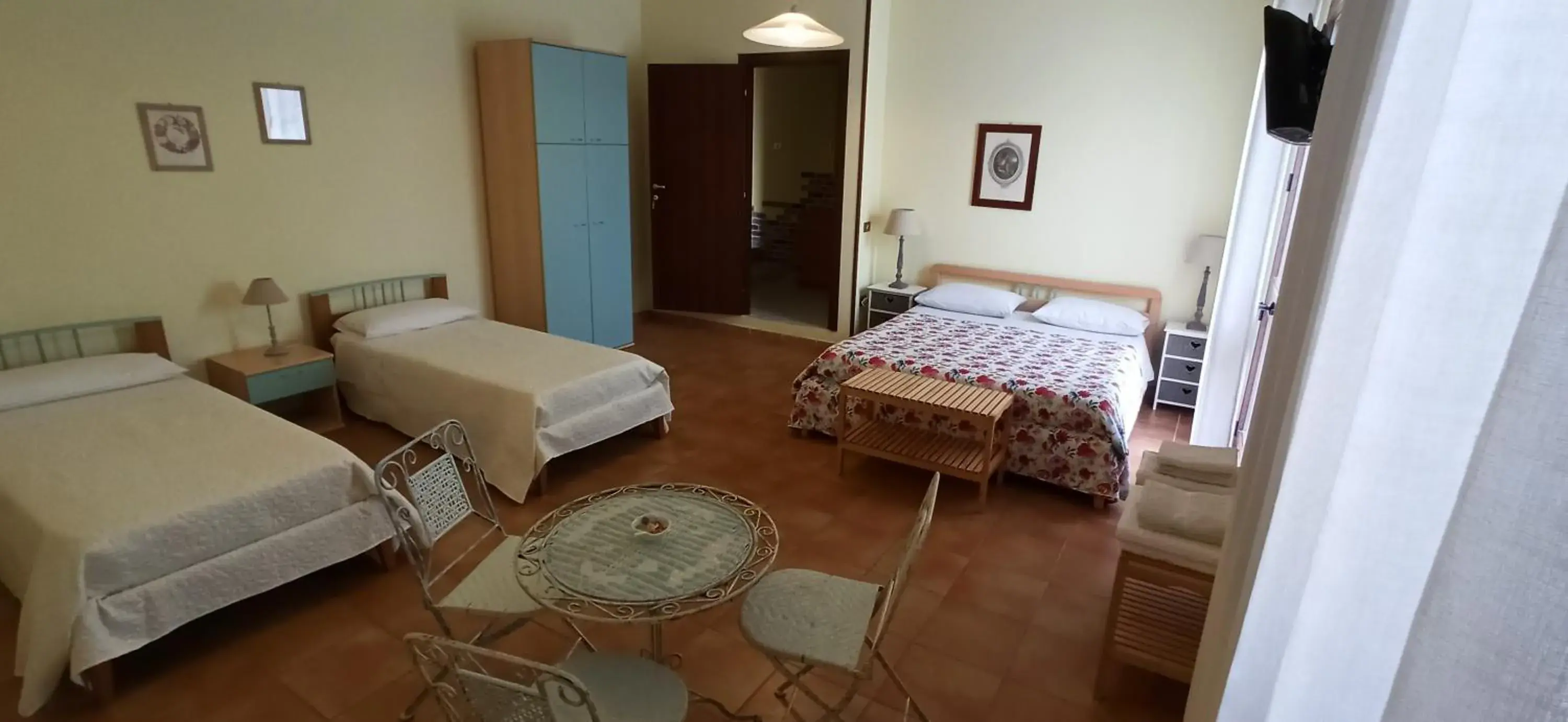 Quadruple Room with Private Bathroom in B&B Casa Piras IUN3880 Quadruple Room with Private Bathroom in B&B Casa Piras IUN3880