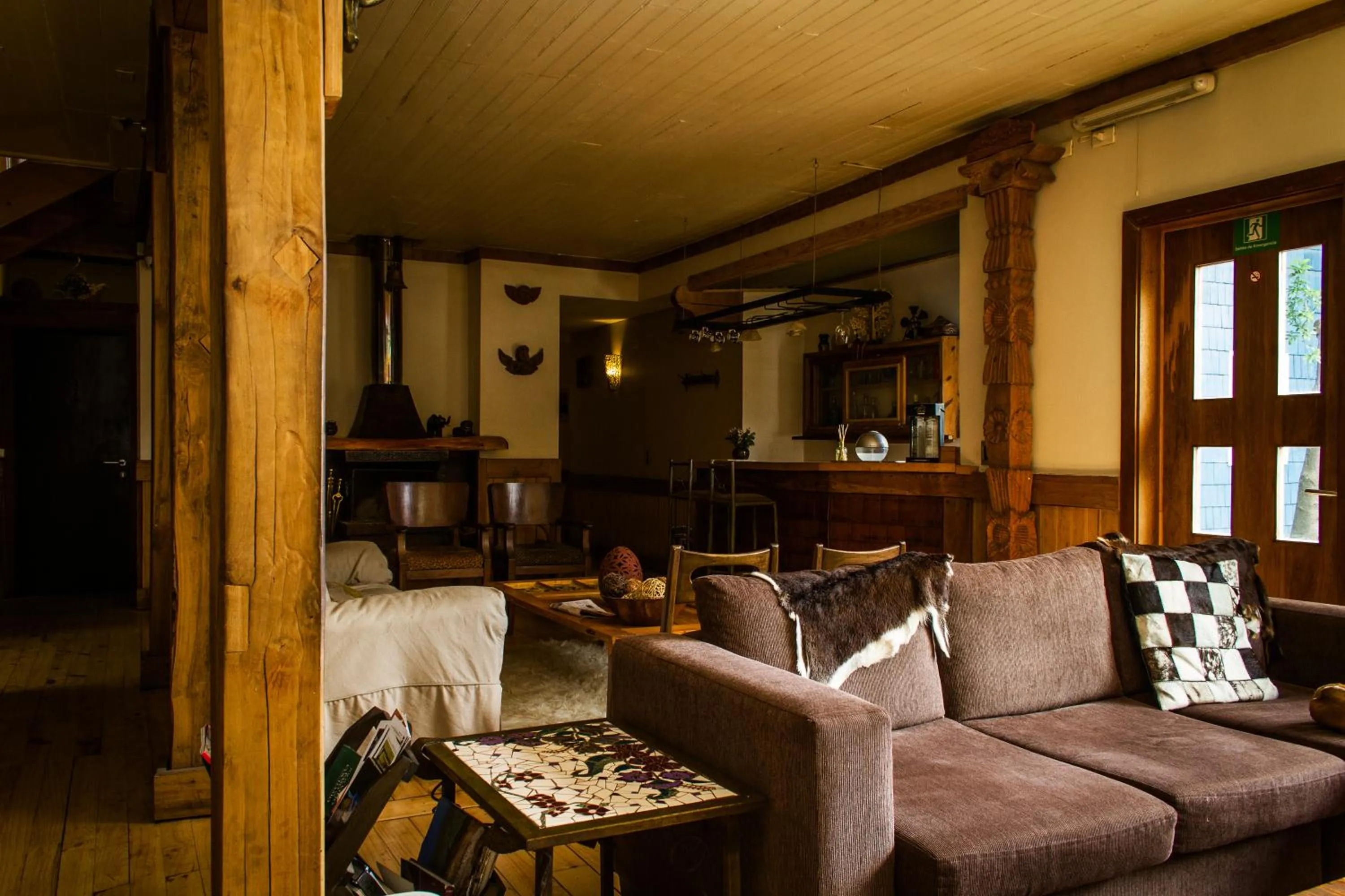 Communal lounge/ TV room in Casa Kalfu Hotel Boutique