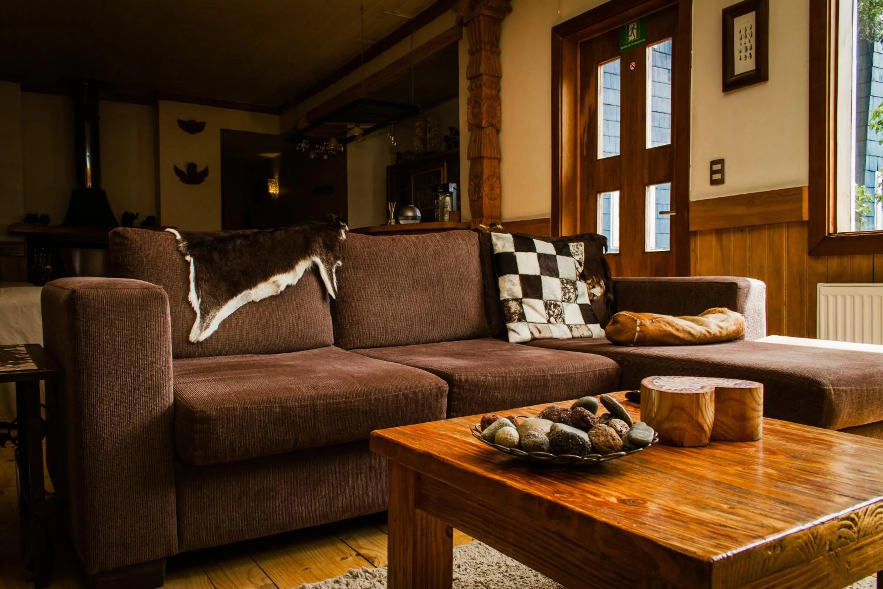 Communal lounge/ TV room in Casa Kalfu Hotel Boutique