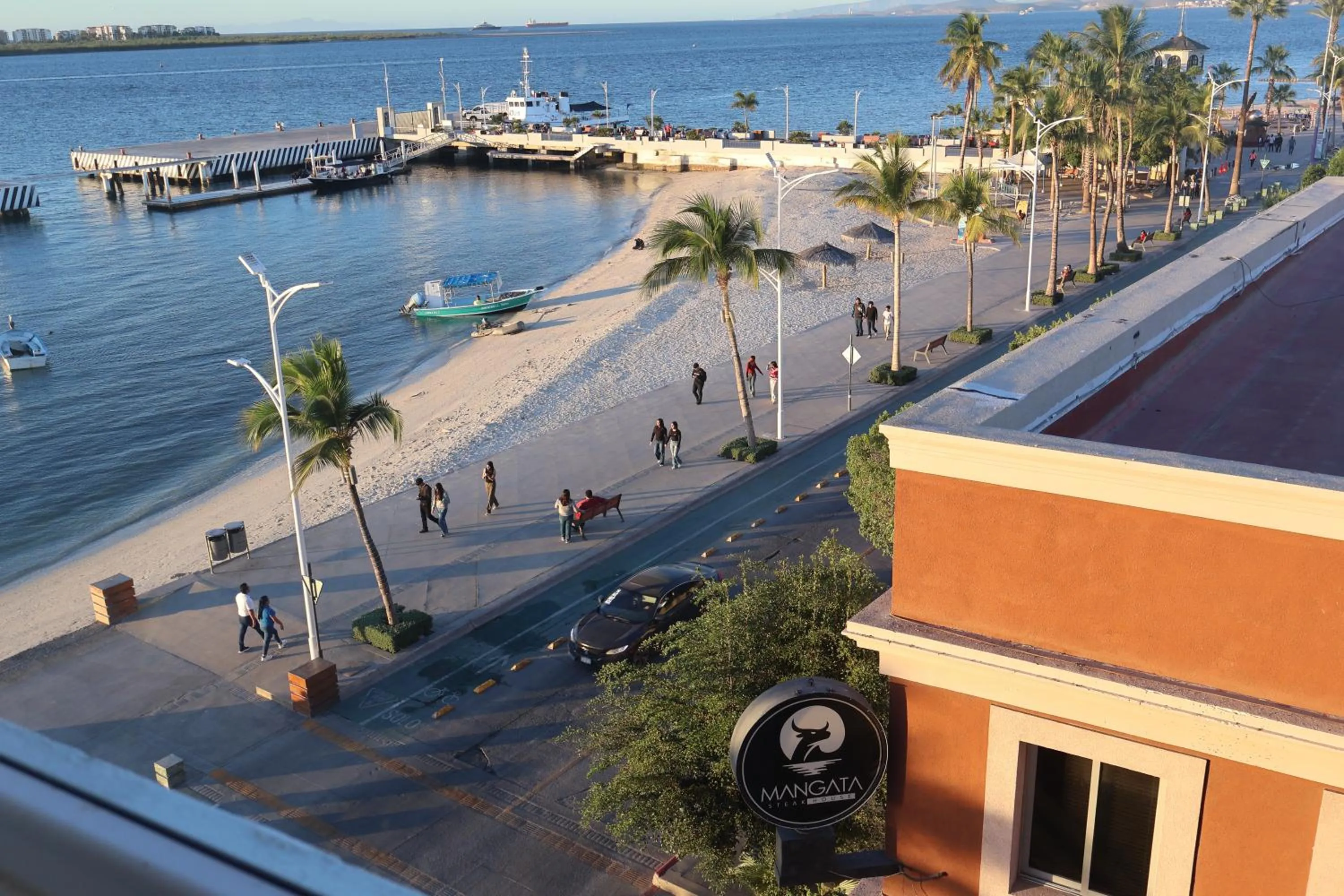 People in Seven Crown La Paz Malecon