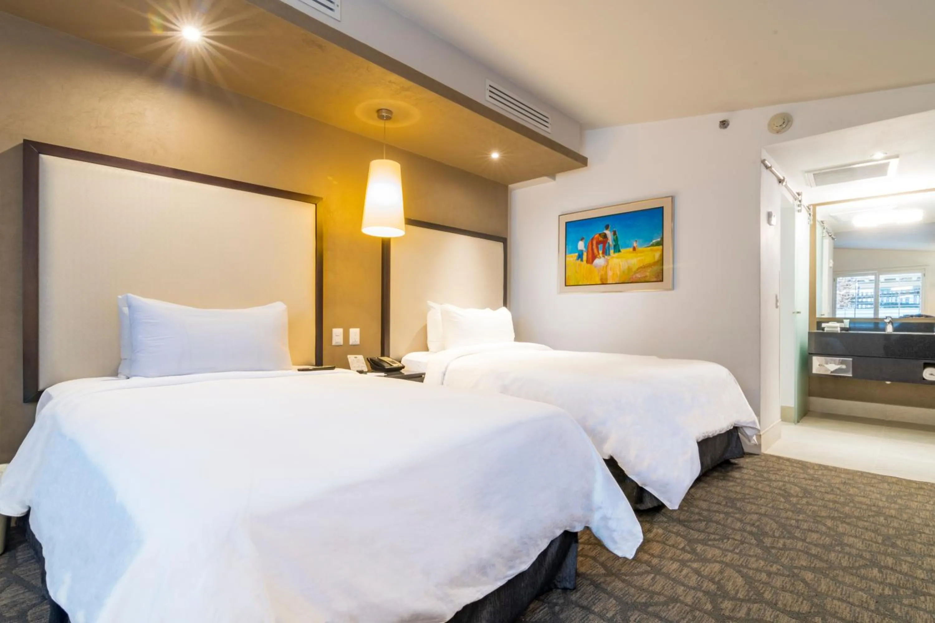 Bed in Hotel Lucerna Mexicali