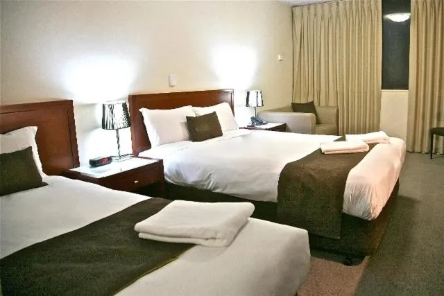 Bed in City Park Hotel