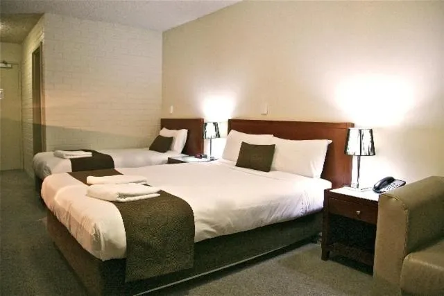 Bed in City Park Hotel