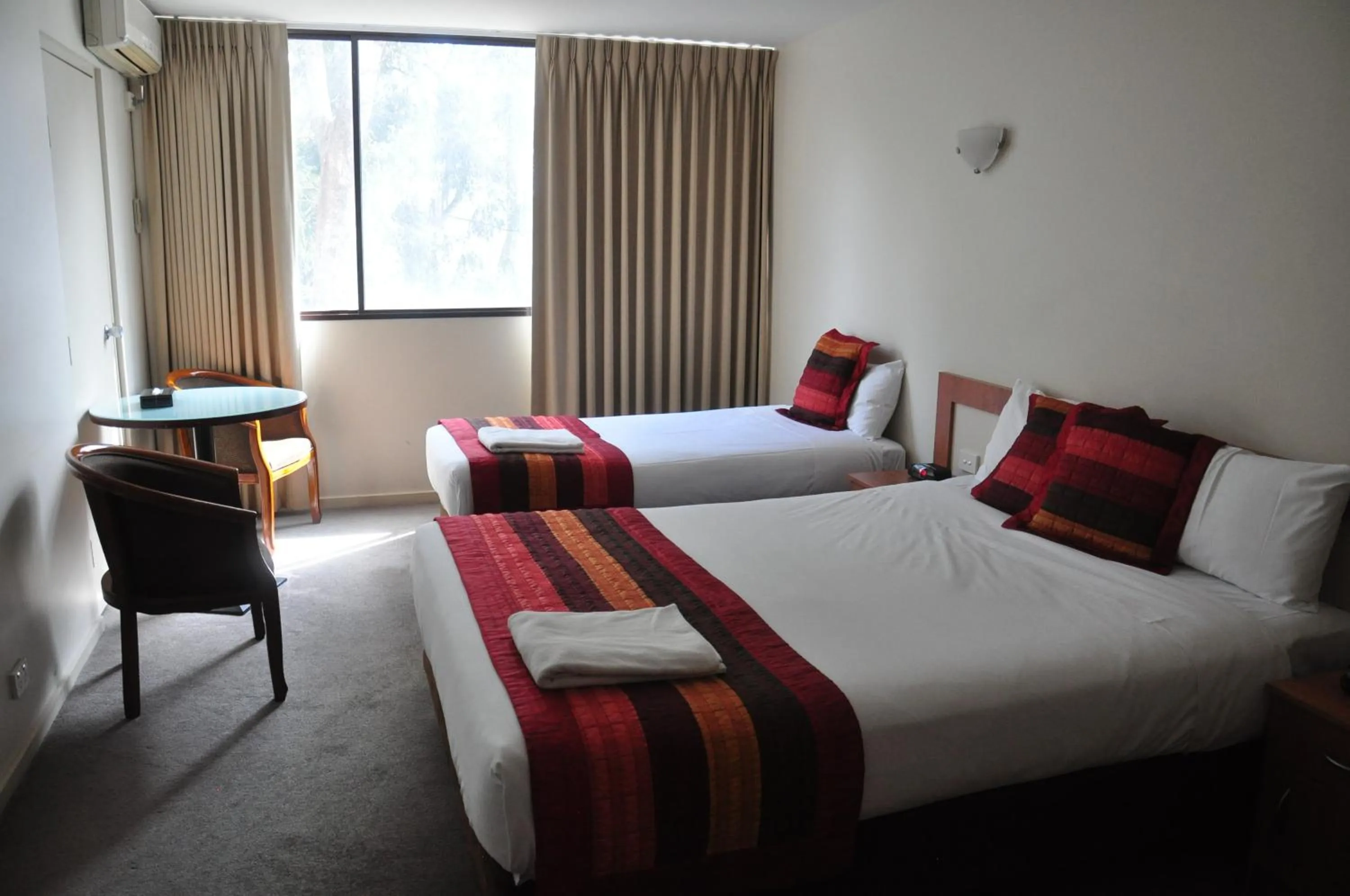 Bed in City Park Hotel