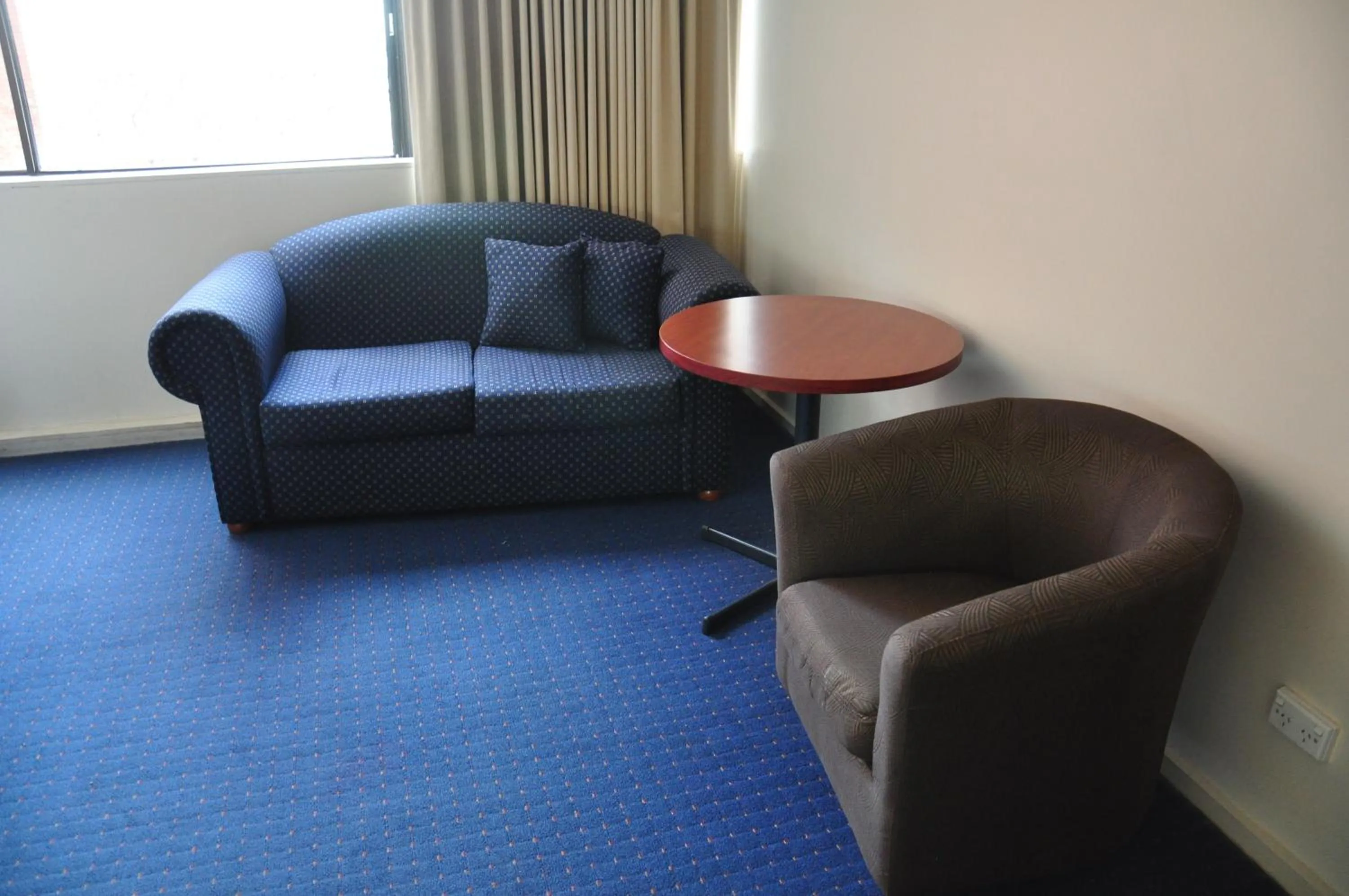 Living room in City Park Hotel