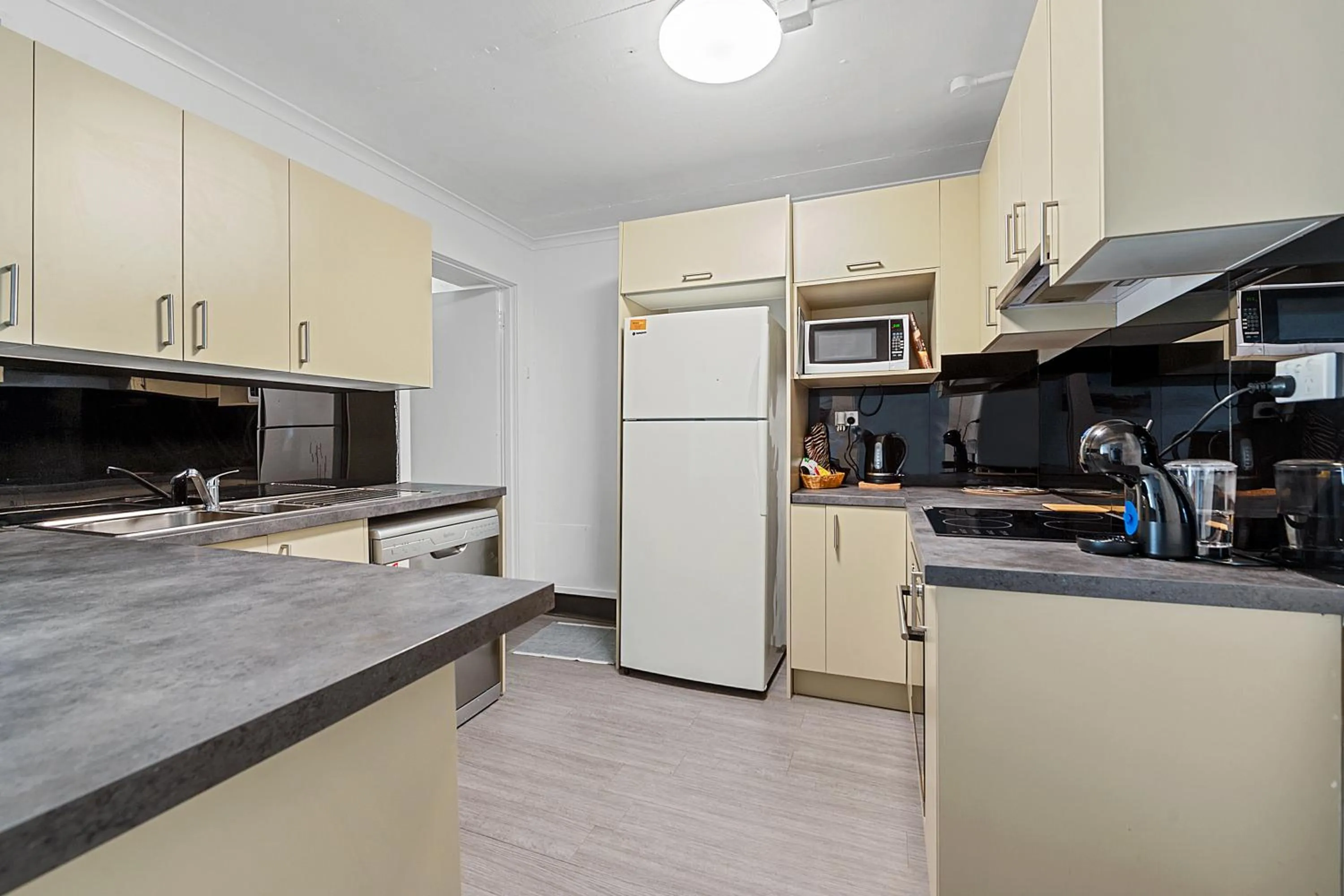 Kitchen or kitchenette in Coach House Launceston