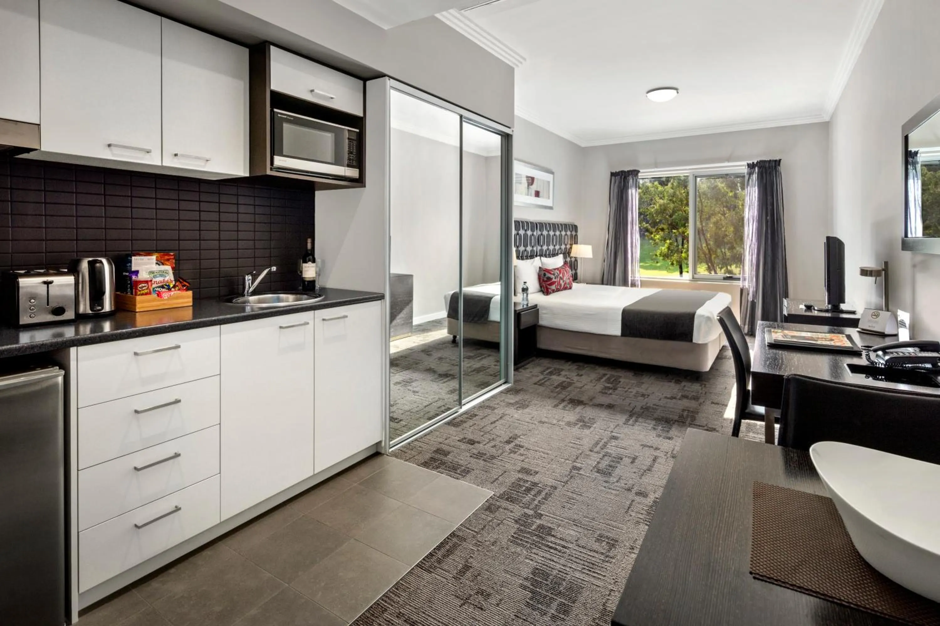 Kitchen or kitchenette, Bed in Quest Campbelltown