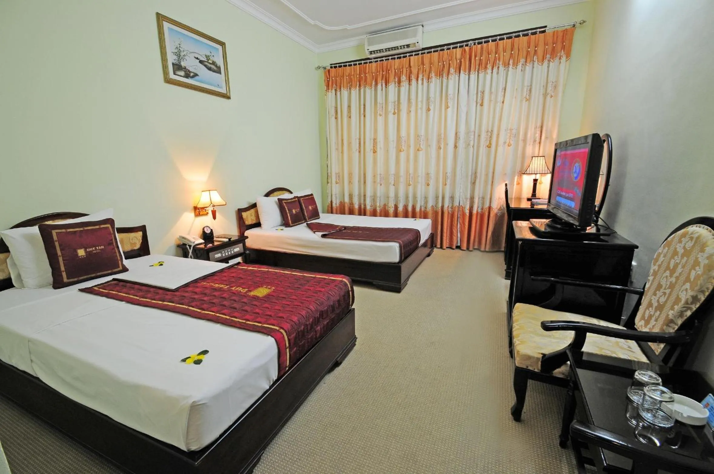 Bed in Duy Tan Hotel