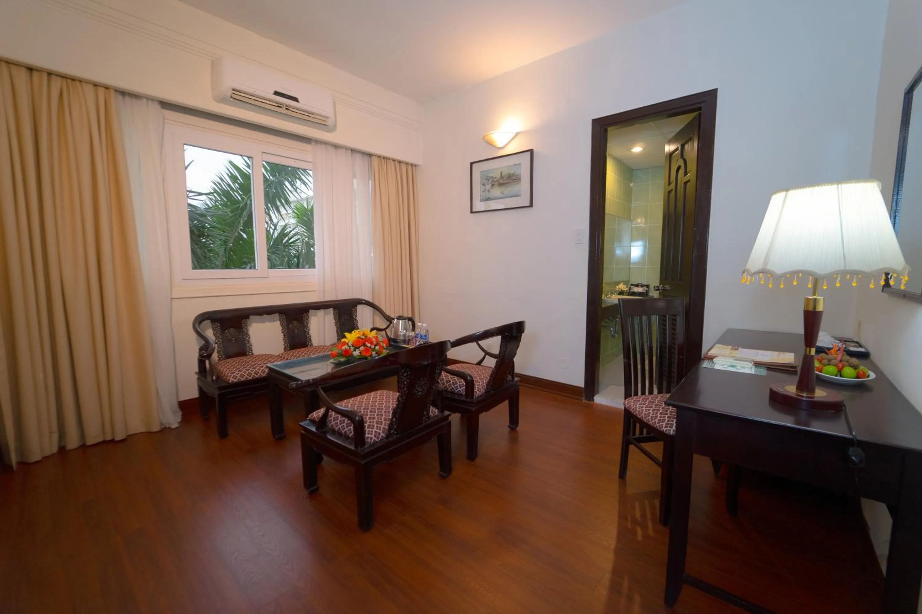 Living room in Century Riverside Hotel Hue