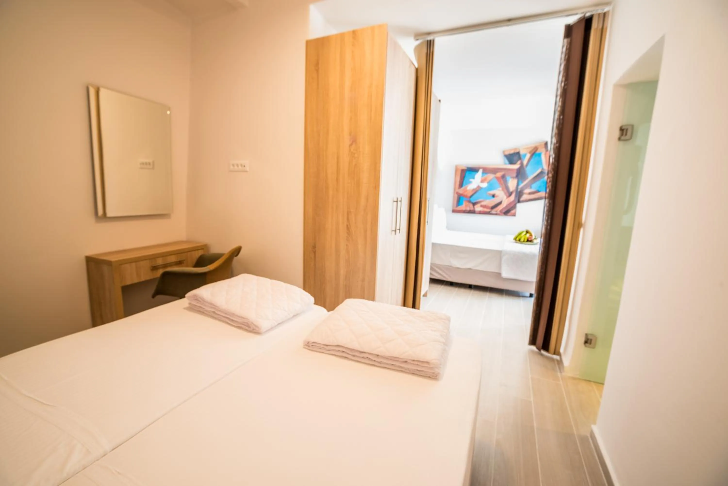 Bed in Kratiras View Luxury Suites